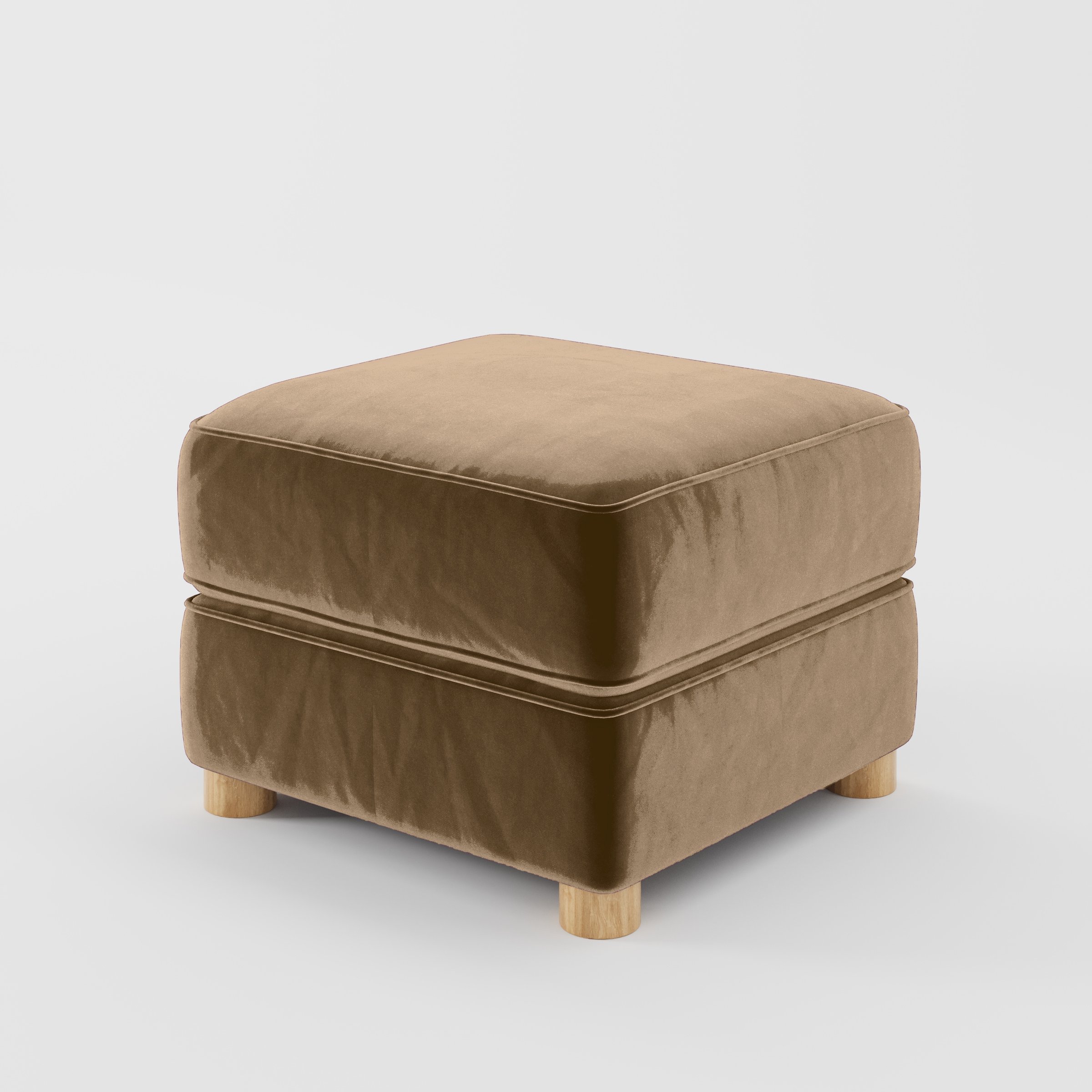Diagonal view of the Fergus footstool upholstered in Plush EasyClean Velvet in Caribou.