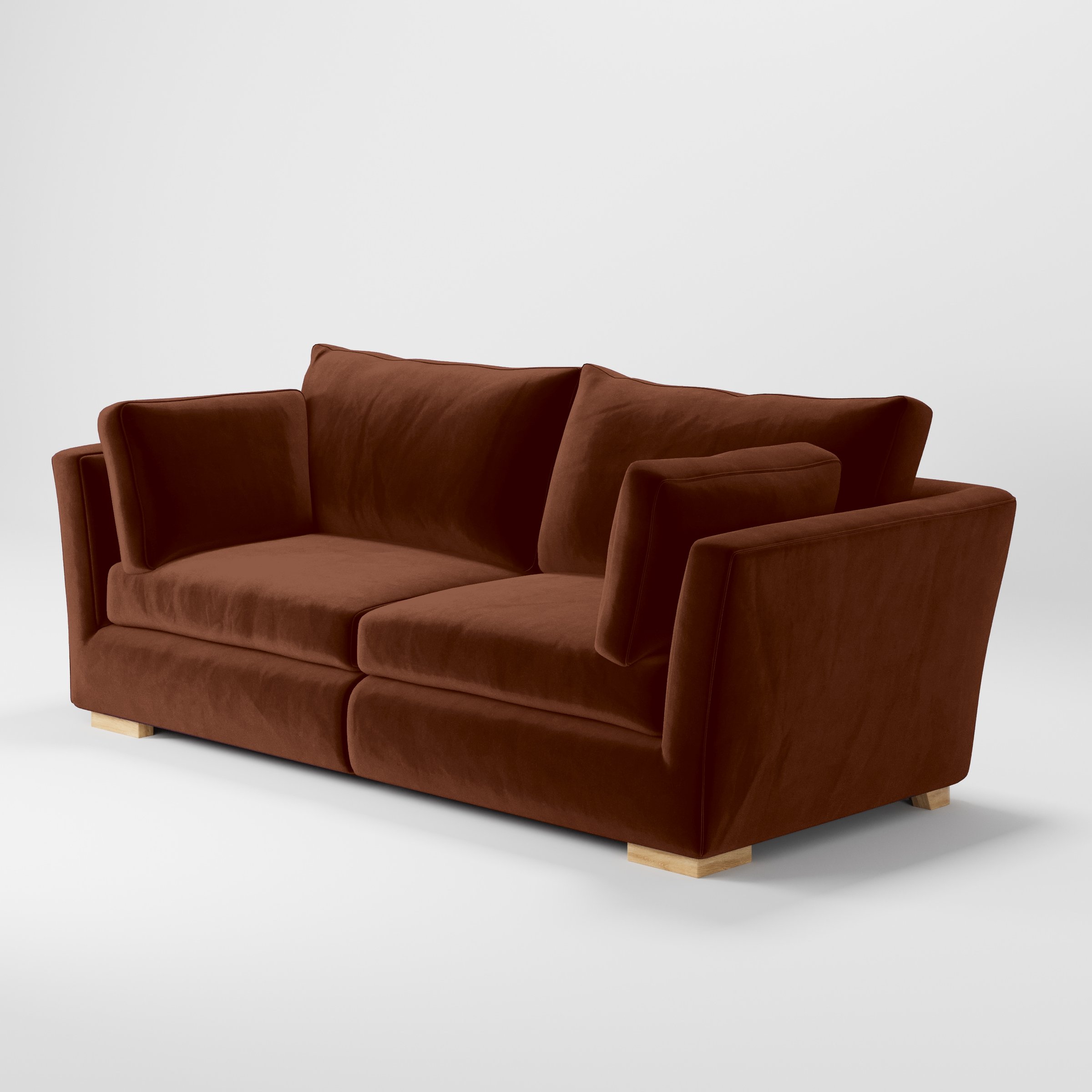 Diagonal view of the Stowe sofa upholstered in Plush EasyClean Velvet in Maple.