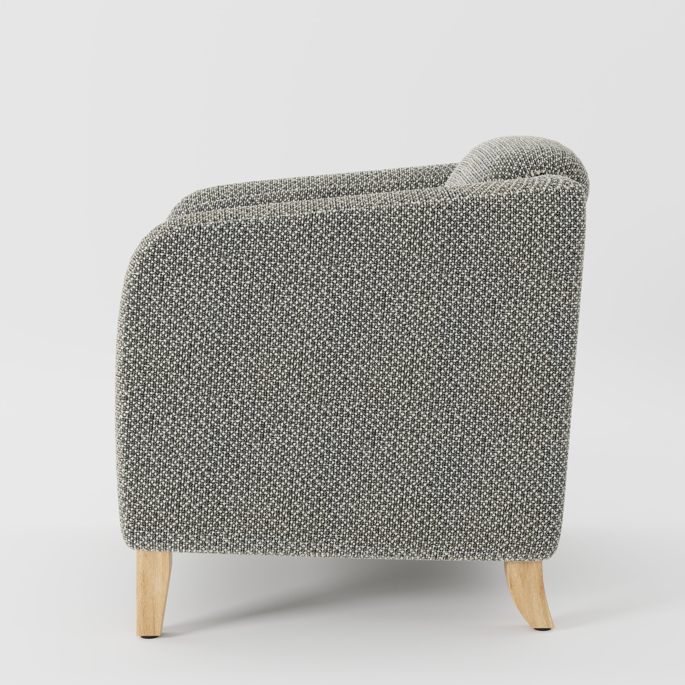 Erne armchair in Rousay Wool Blend Tar and Chalk shown in side profile displaying proportions and overall silhouette.