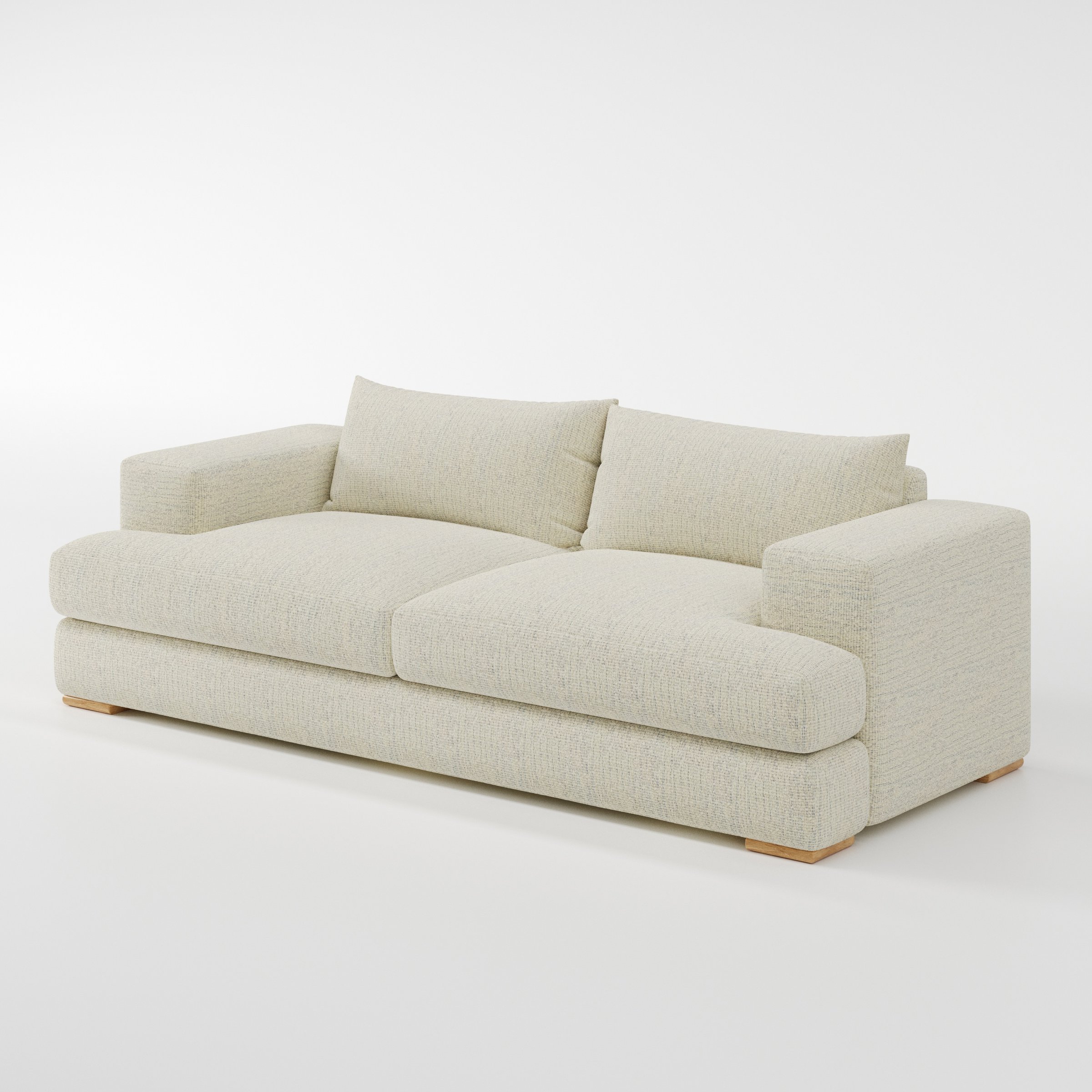 Fane sofa in Orsay Boucle Cream and Marine shown at a diagonal angle highlighting arm profile and seat depth.