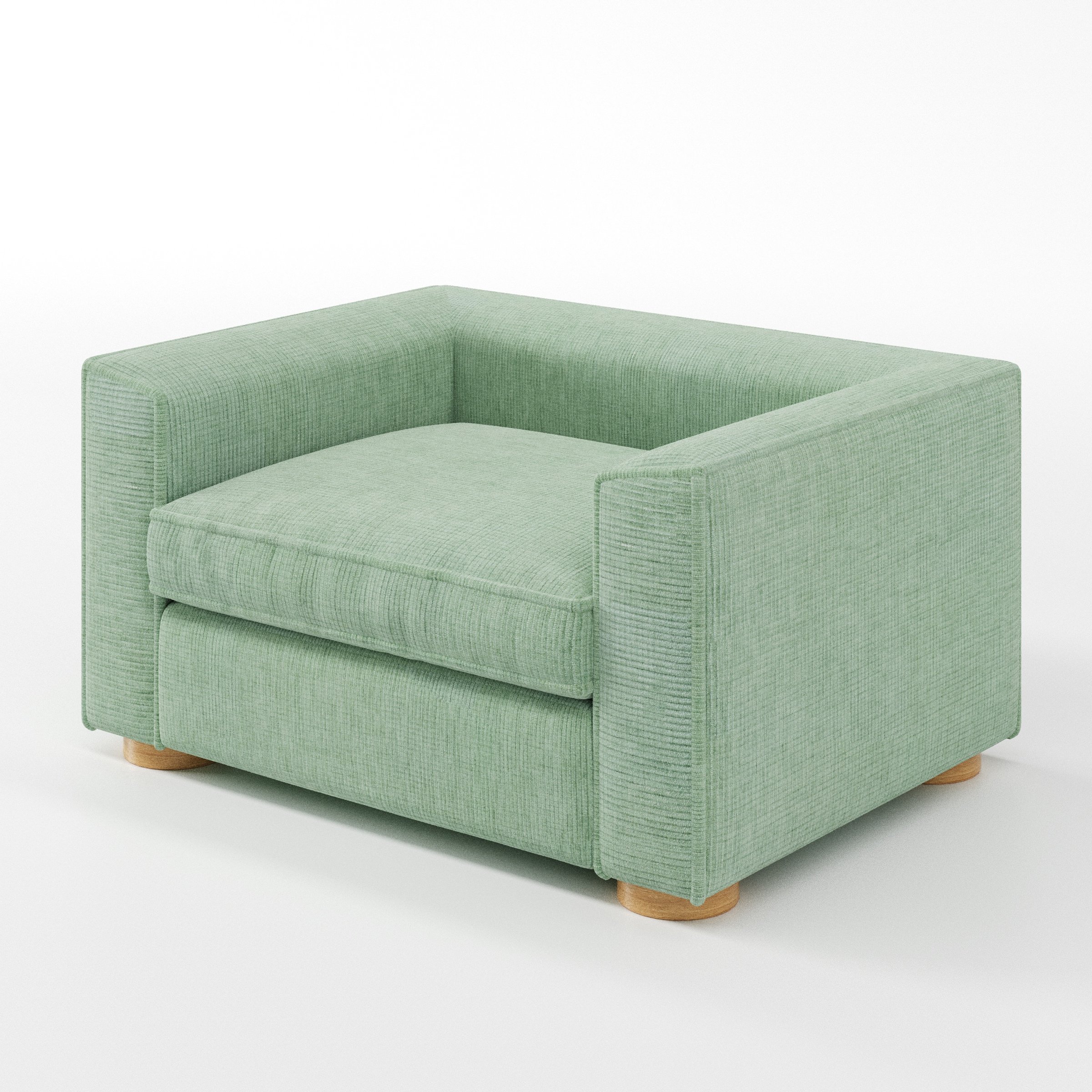 Feale armchair in Caldey Velvet Corduroy Eucalyptus shown at a diagonal angle highlighting arms and seat depth.