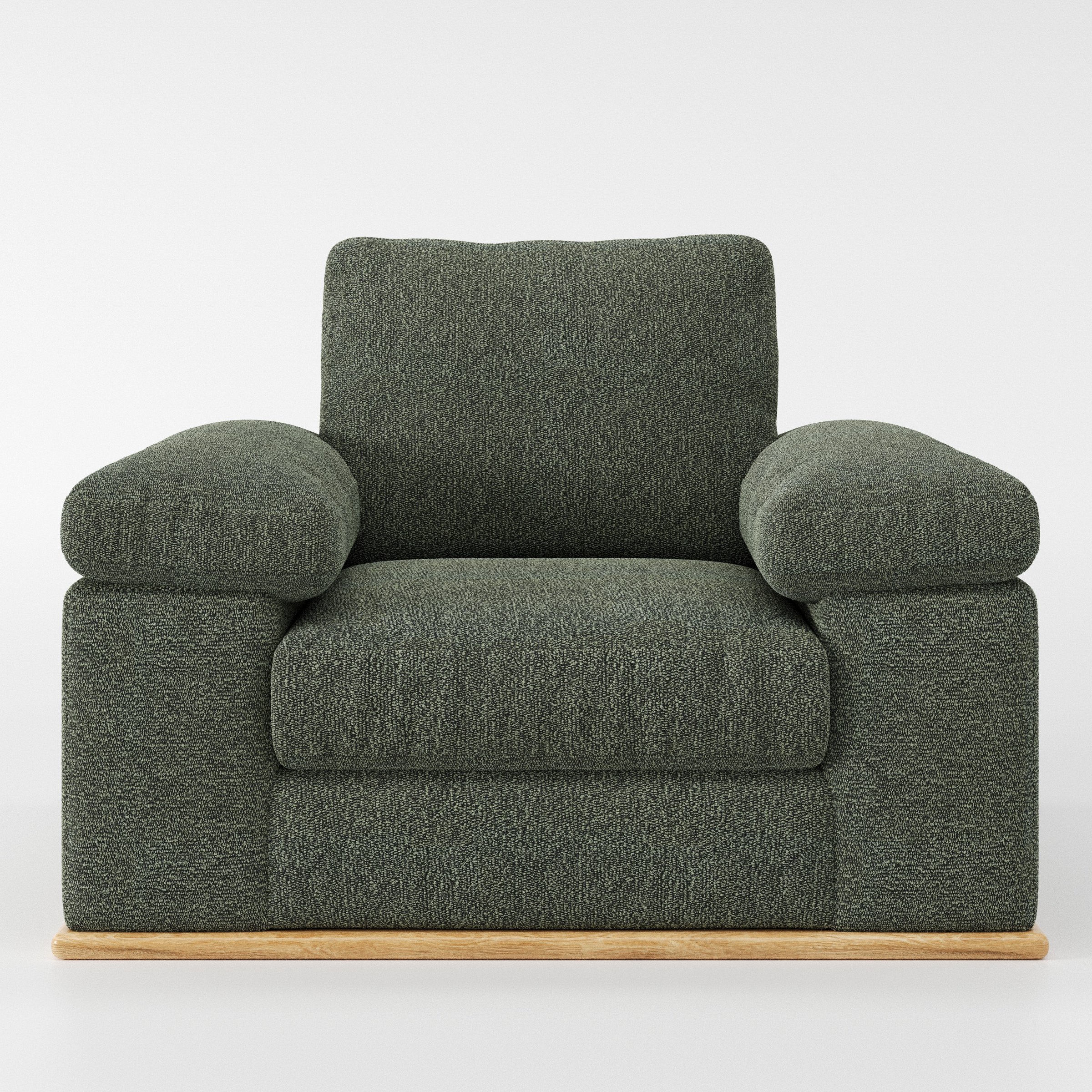 Cusher armchair in Kilda Boucle Moss shown front-on against a neutral studio backdrop.