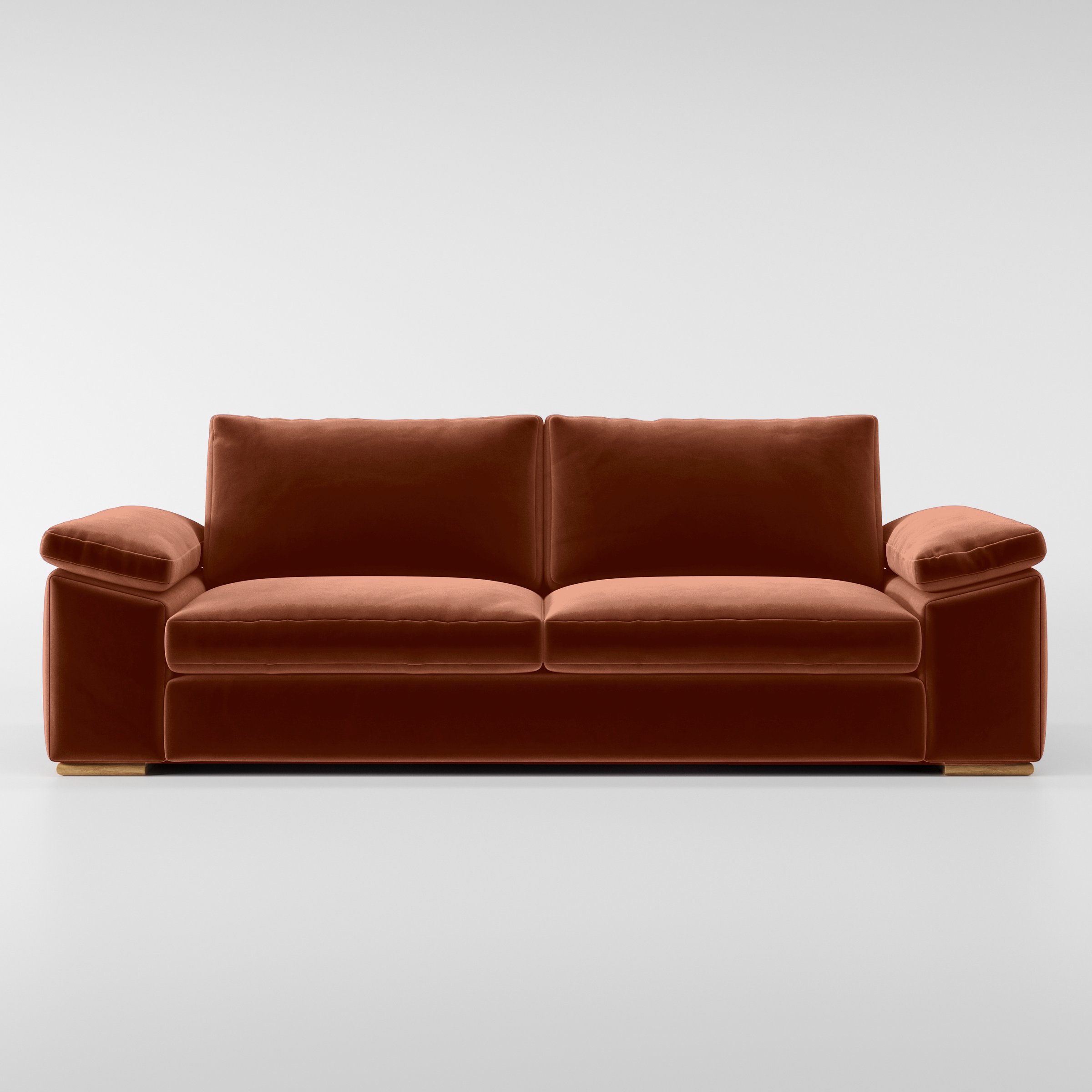 Front view of the Moy sofa upholstered in Plush EasyClean Velvet in Apricot.