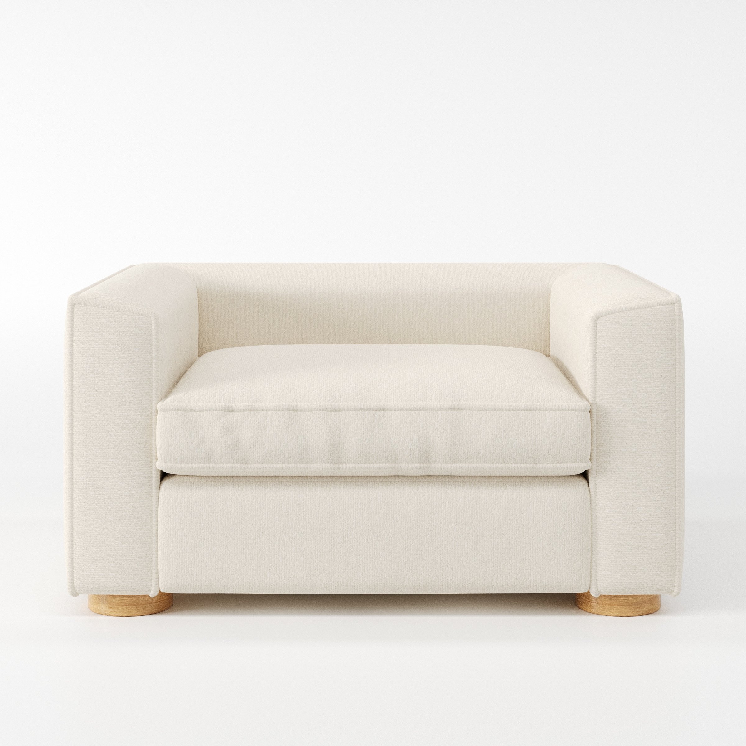 Feale armchair in Kilda Boucle Cream shown front-on against a neutral studio backdrop.