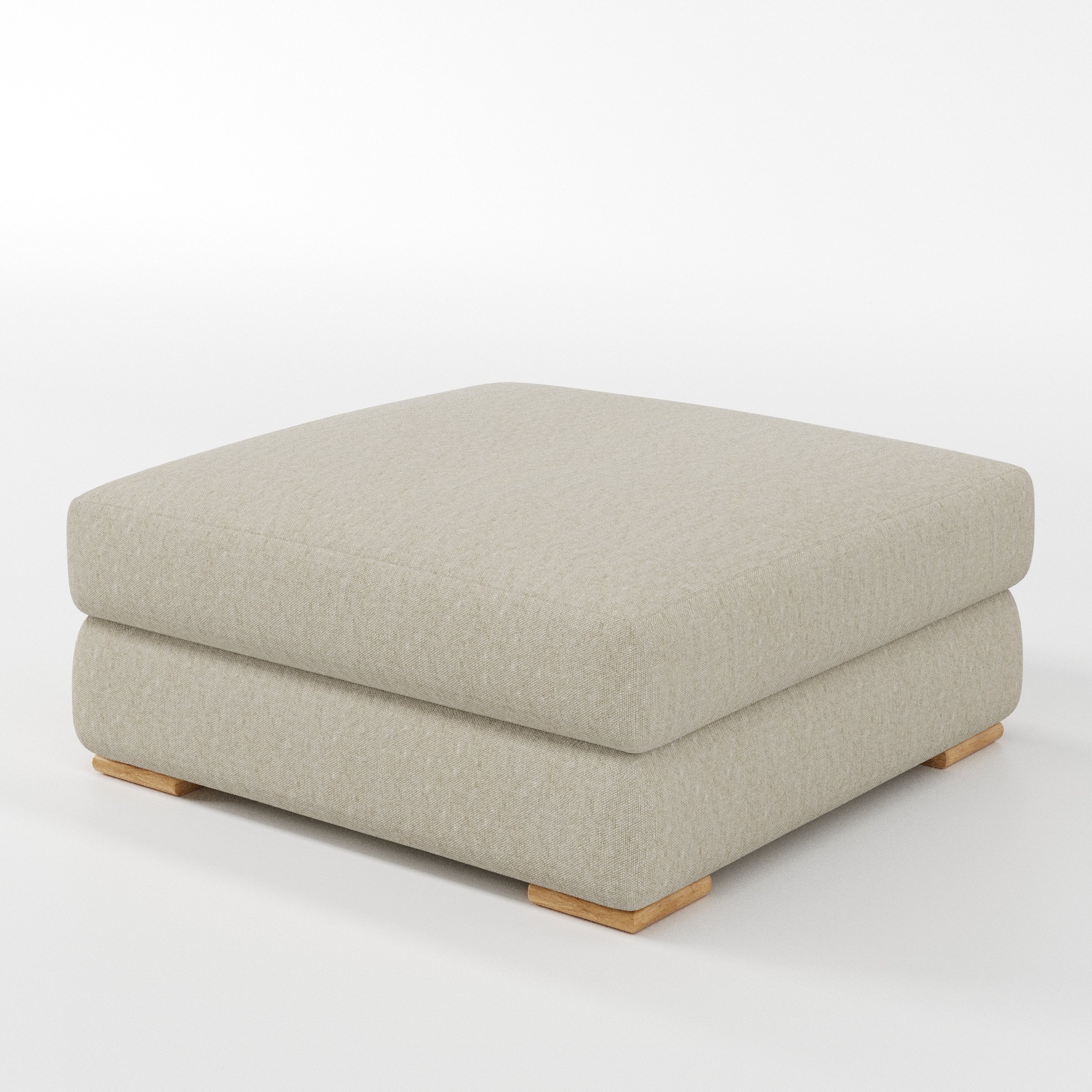 Fane footstool in Alderney Linen Oatmeal shown at a diagonal angle highlighting low profile and structured form.