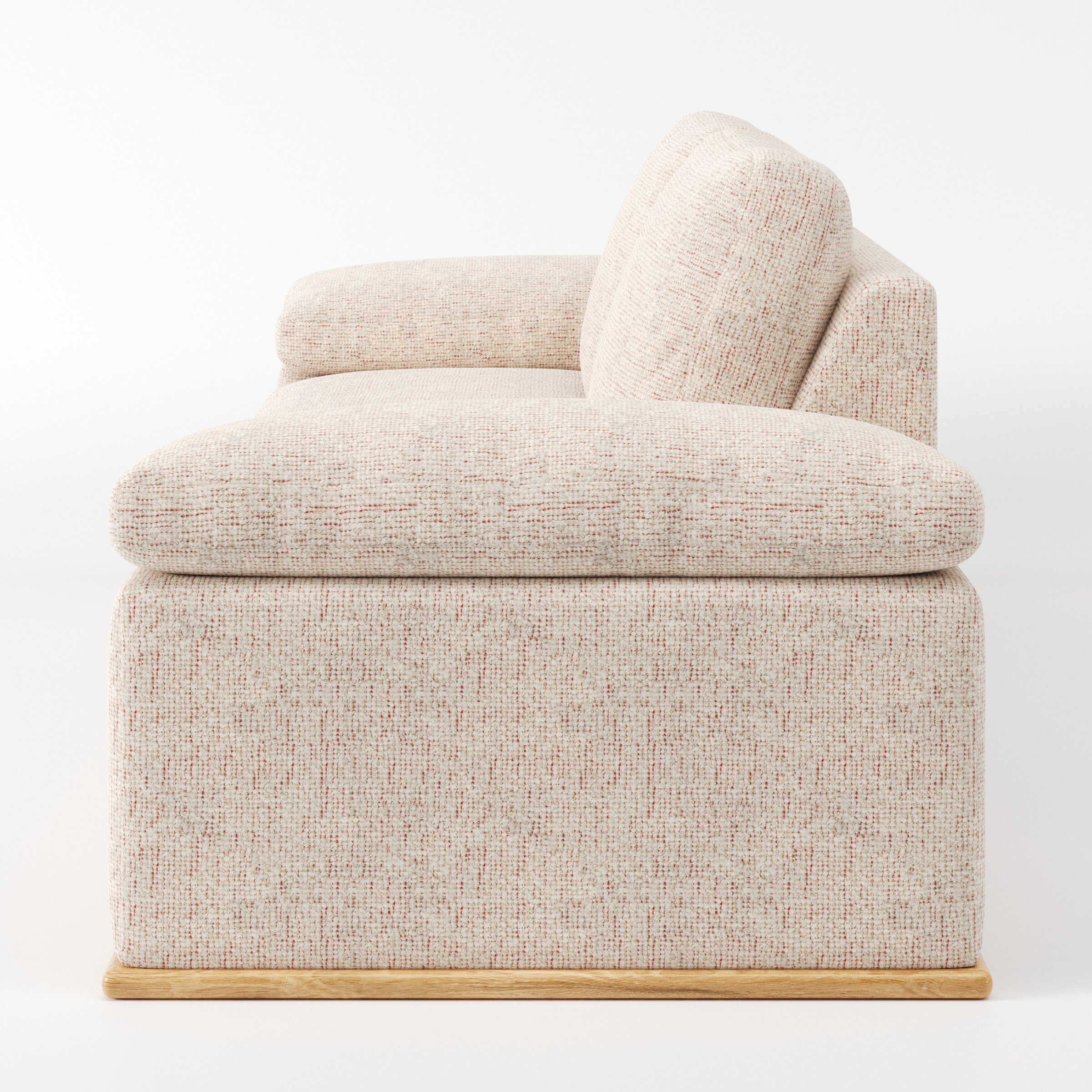 Cusher sofa in Orsay Boucle Cream and Copper shown in side profile displaying proportions and overall silhouette.