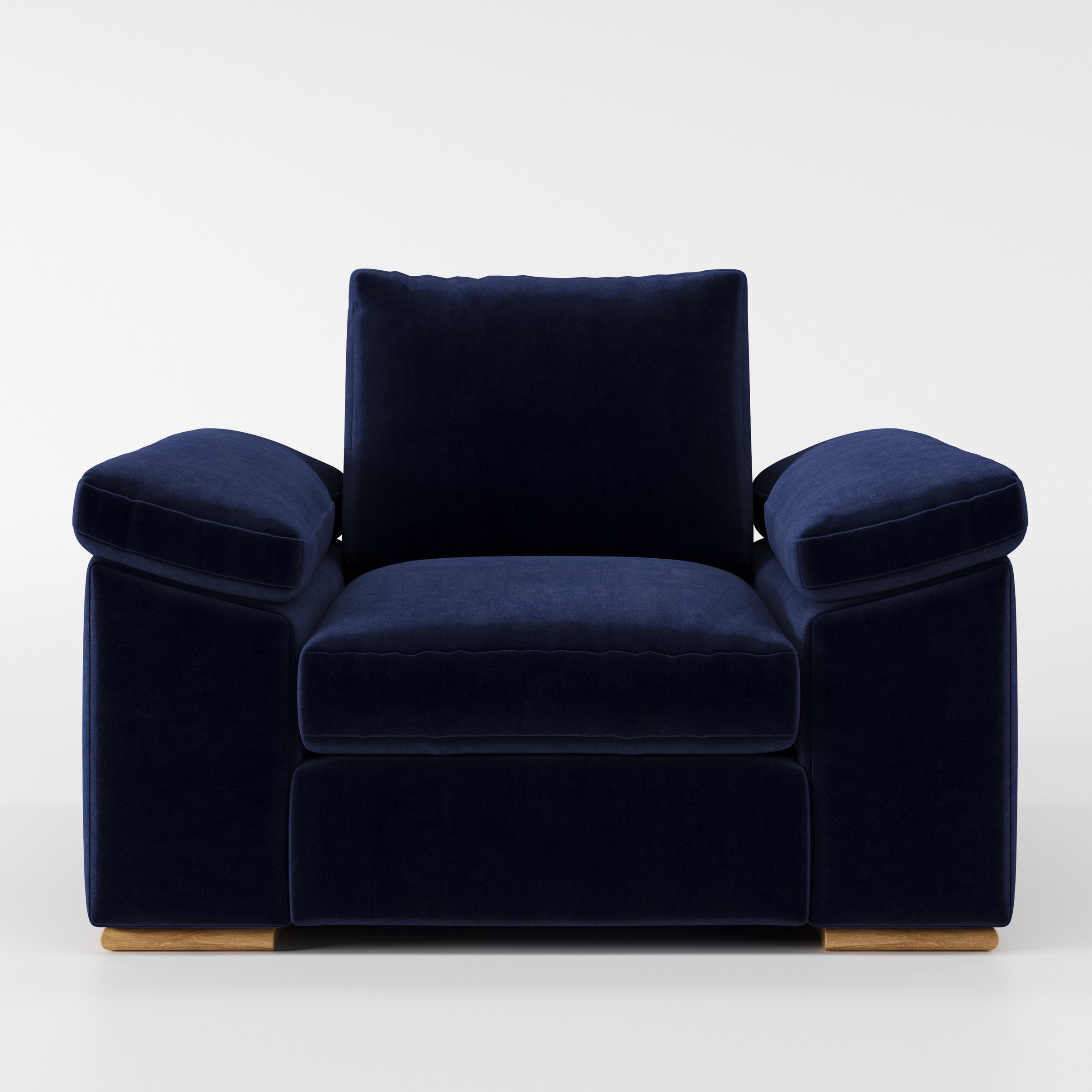 Moy armchair in Noss Velvet Navy shown front-on against a neutral studio backdrop.