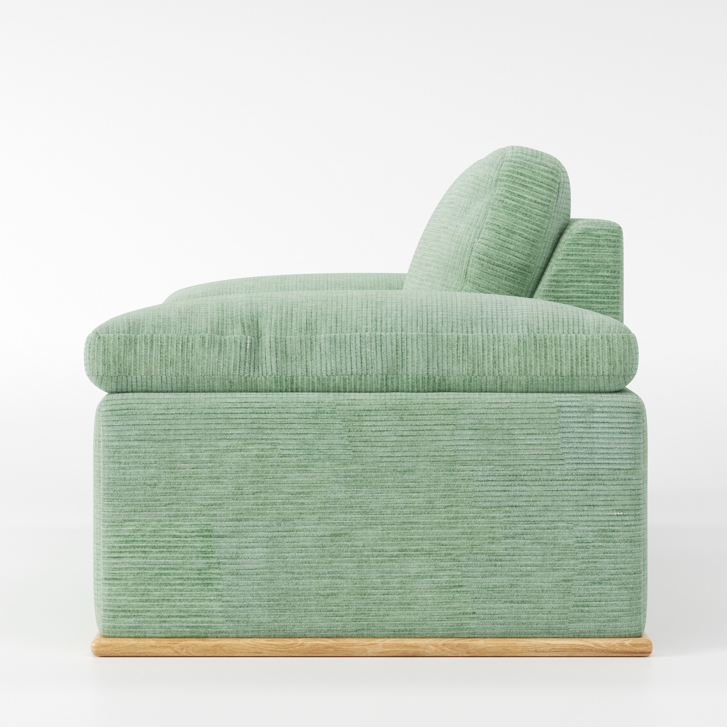 Cusher armchair in Caldey Velvet Corduroy Eucalyptus shown in side profile displaying proportions and overall silhouette.