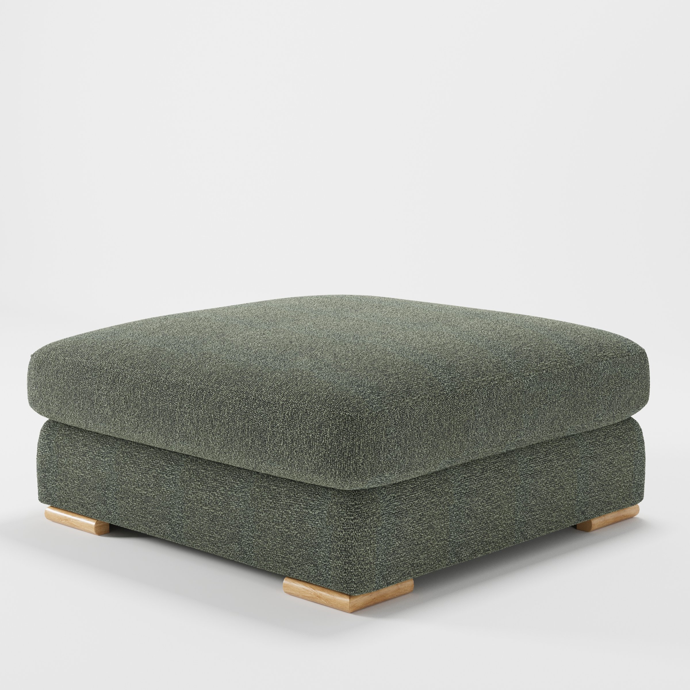 Olton footstool in Kilda Boucle Moss shown at a diagonal angle highlighting low profile and inset wooden base.