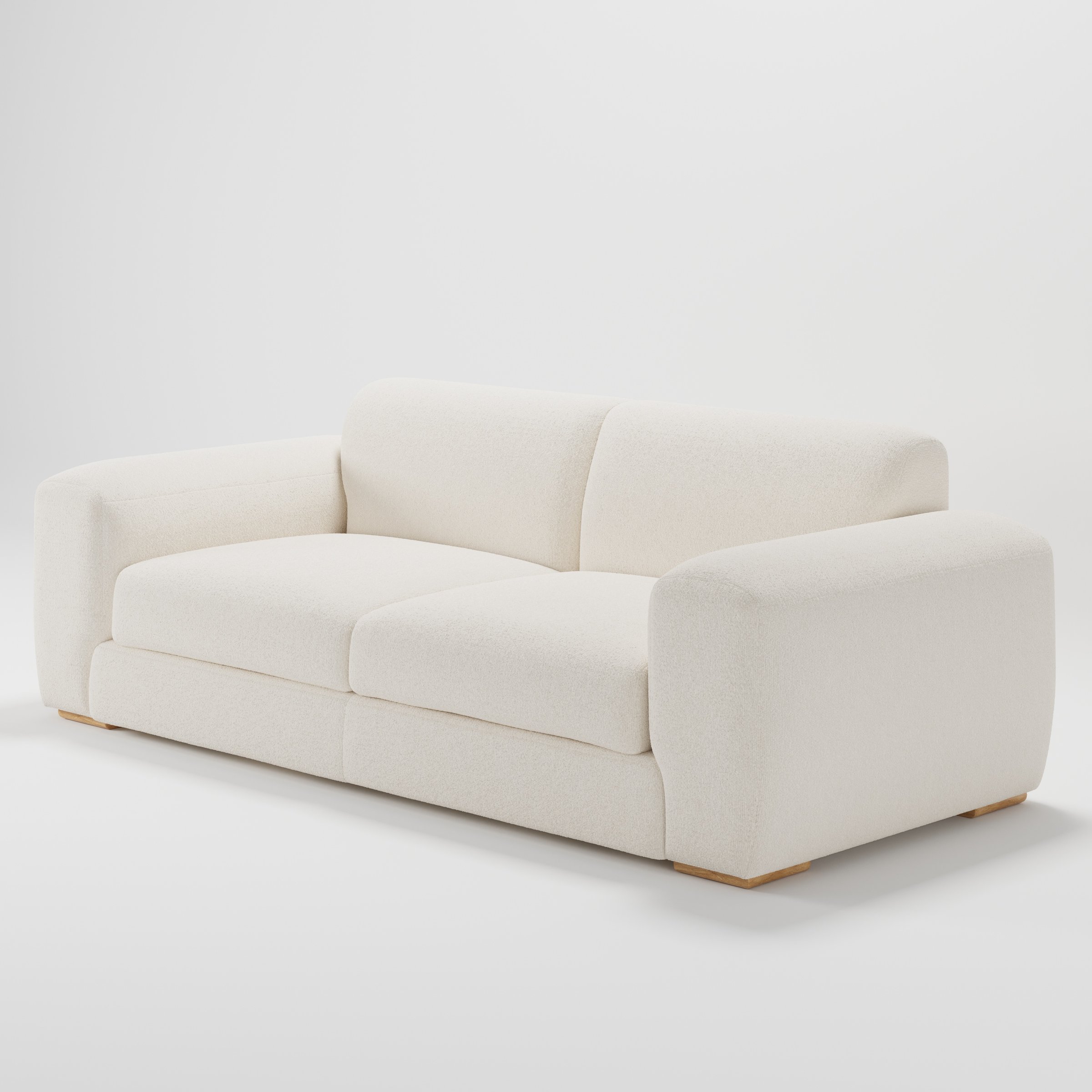 Darwell sofa in Kilda Boucle Cream shown at a diagonal angle highlighting arm profile and seat depth.
