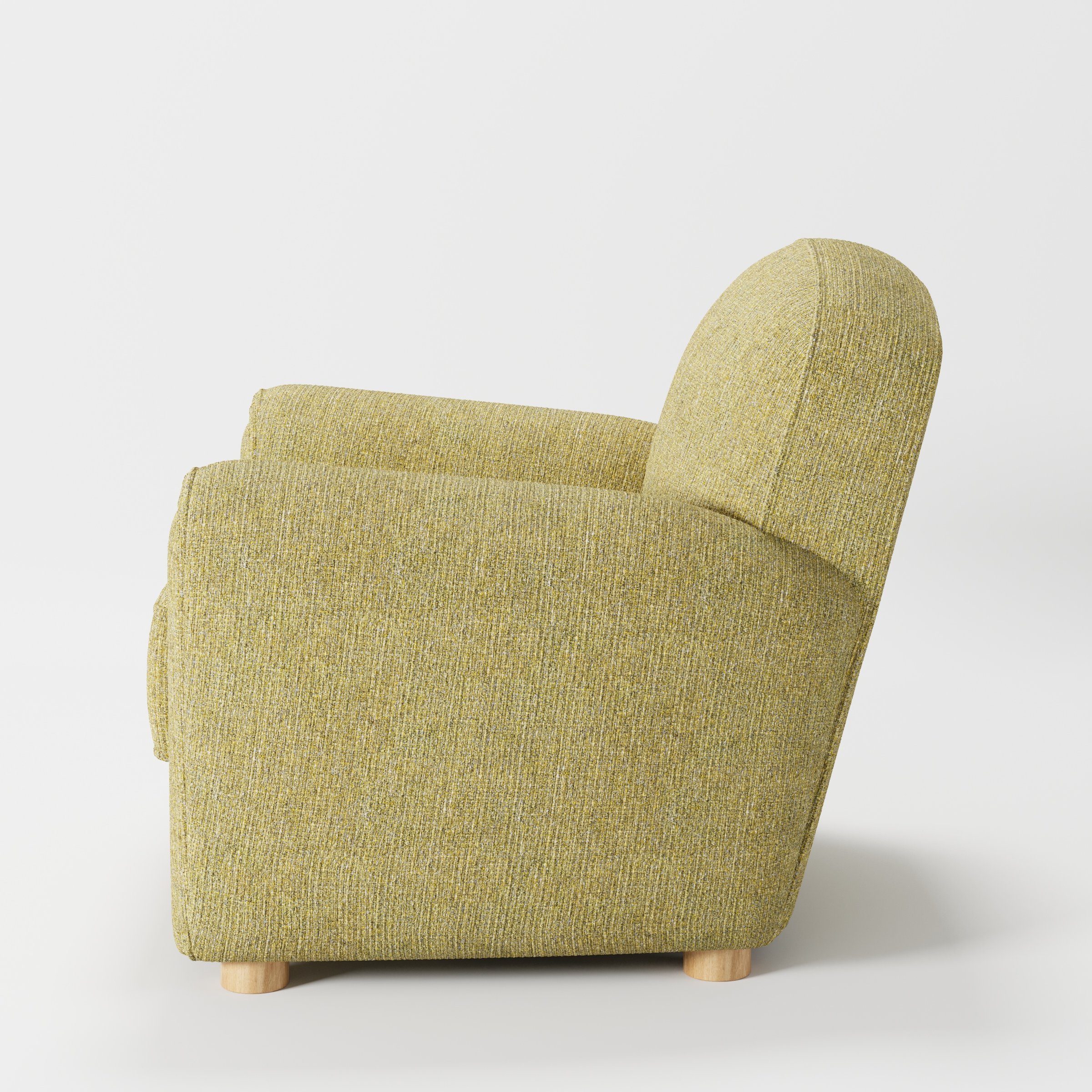 Fergus armchair in Heyling Tweed Sencha shown in side profile displaying proportions and overall silhouette.