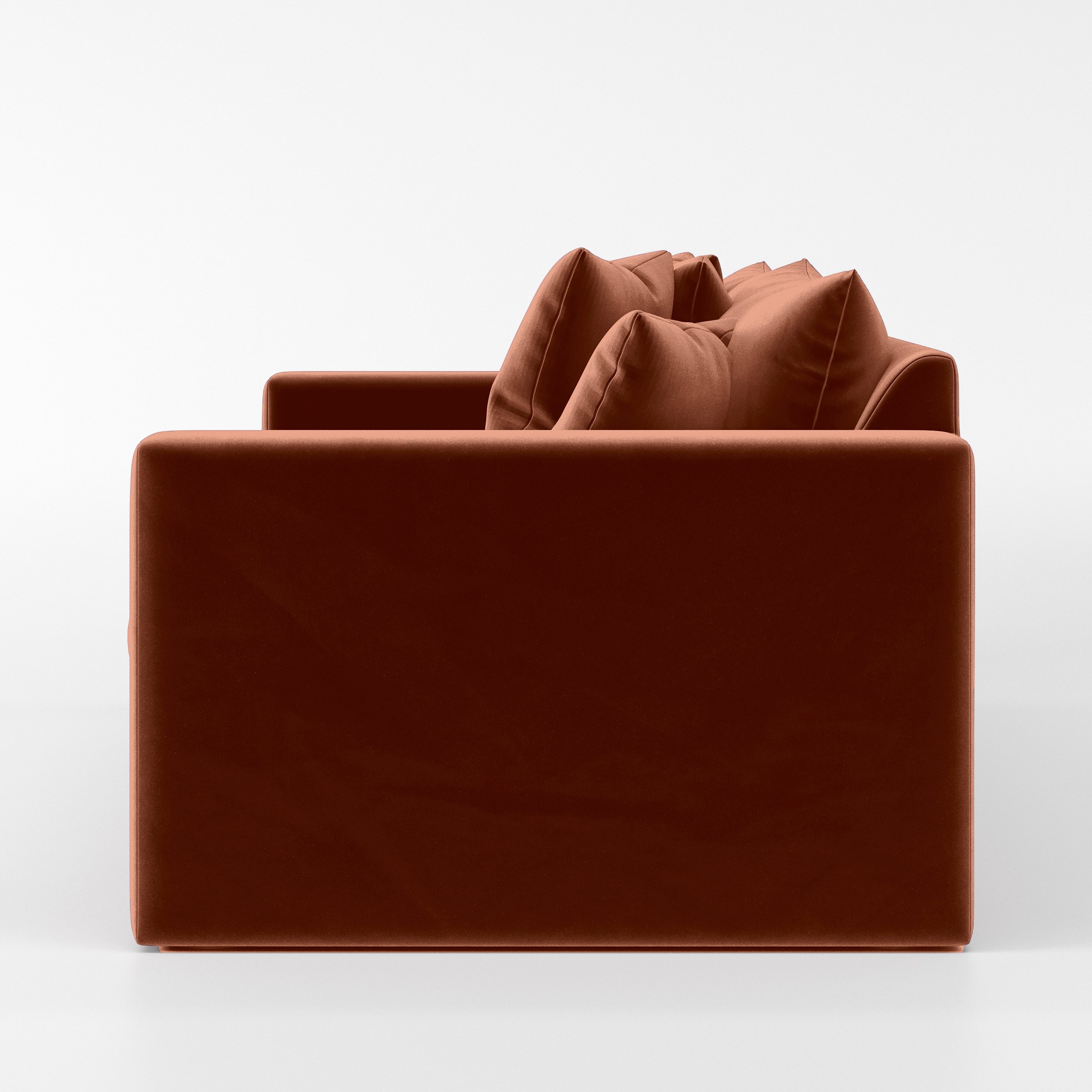 Side view of the Coniston sofa upholstered in Plush EasyClean Velvet in Apricot.