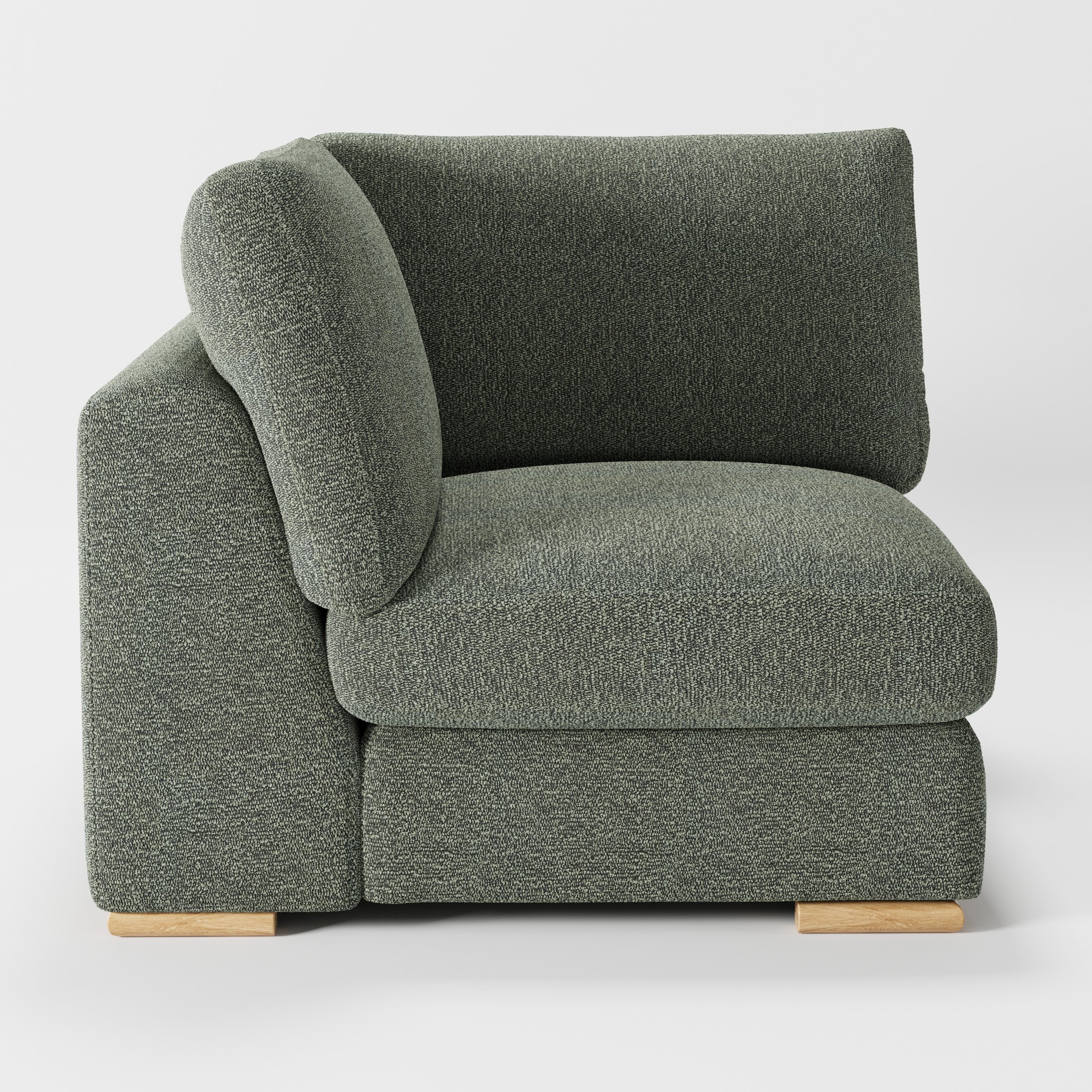 Olton corner unit in Kilda bouclé moss fabric, left side view showing arm form and dense bouclé texture