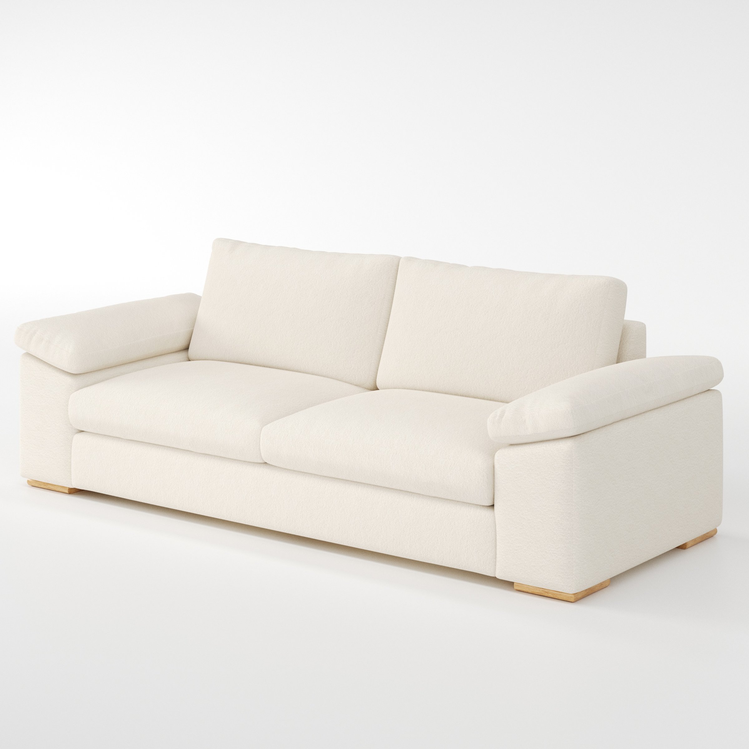 Moy sofa in Kilda Boucle Cream shown at a diagonal angle highlighting arm profile and seat depth.