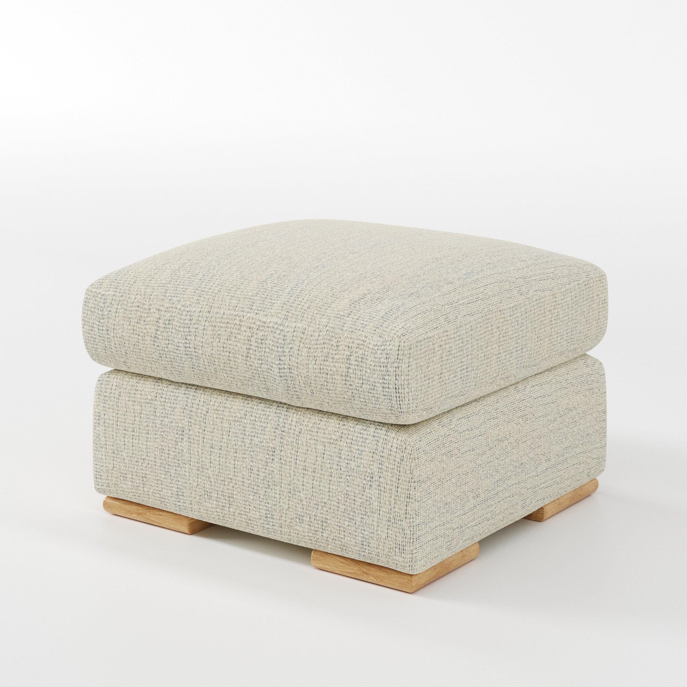 Moy footstool in Orsay Boucle Cream and Marine shown at a diagonal angle highlighting deep cushioning and low wooden base.