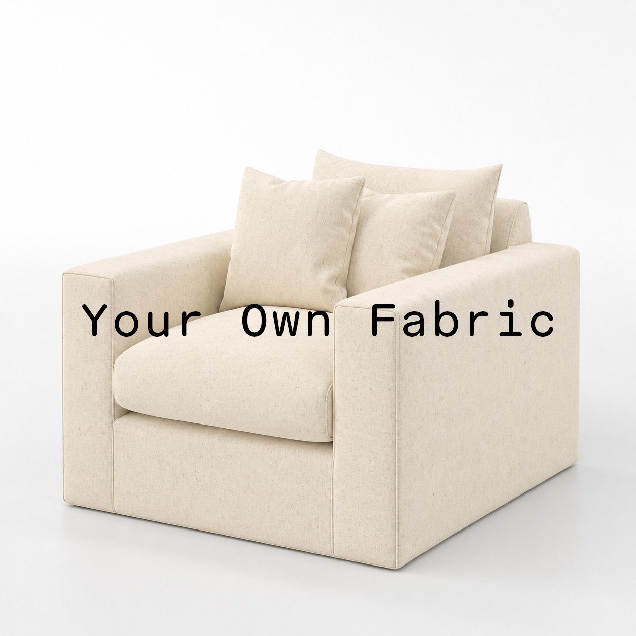 Diagonal view of the Coniston armchair upholstered in customers own material calico cotton fabric.