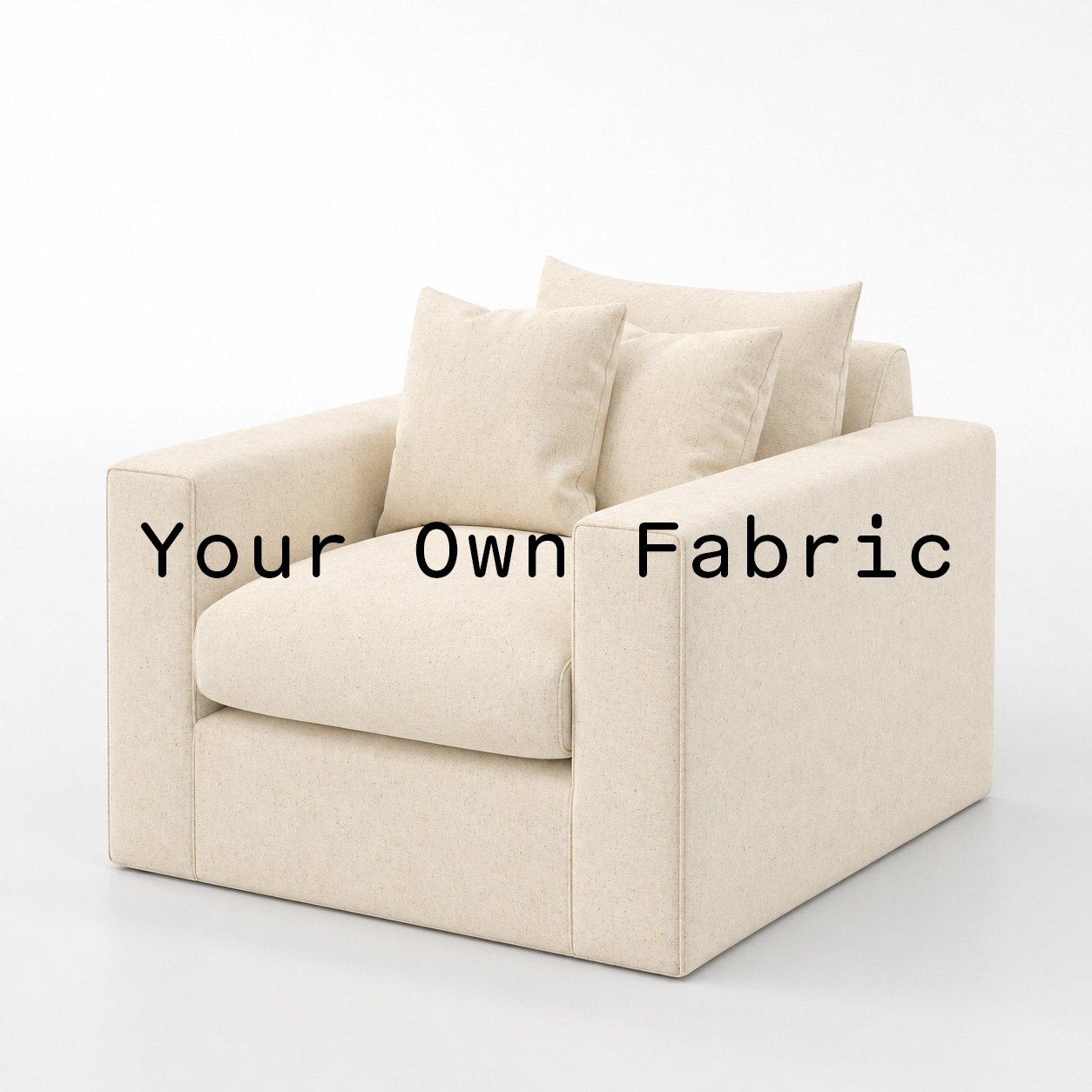 Diagonal view of the Coniston armchair upholstered in customers own material calico cotton fabric.
