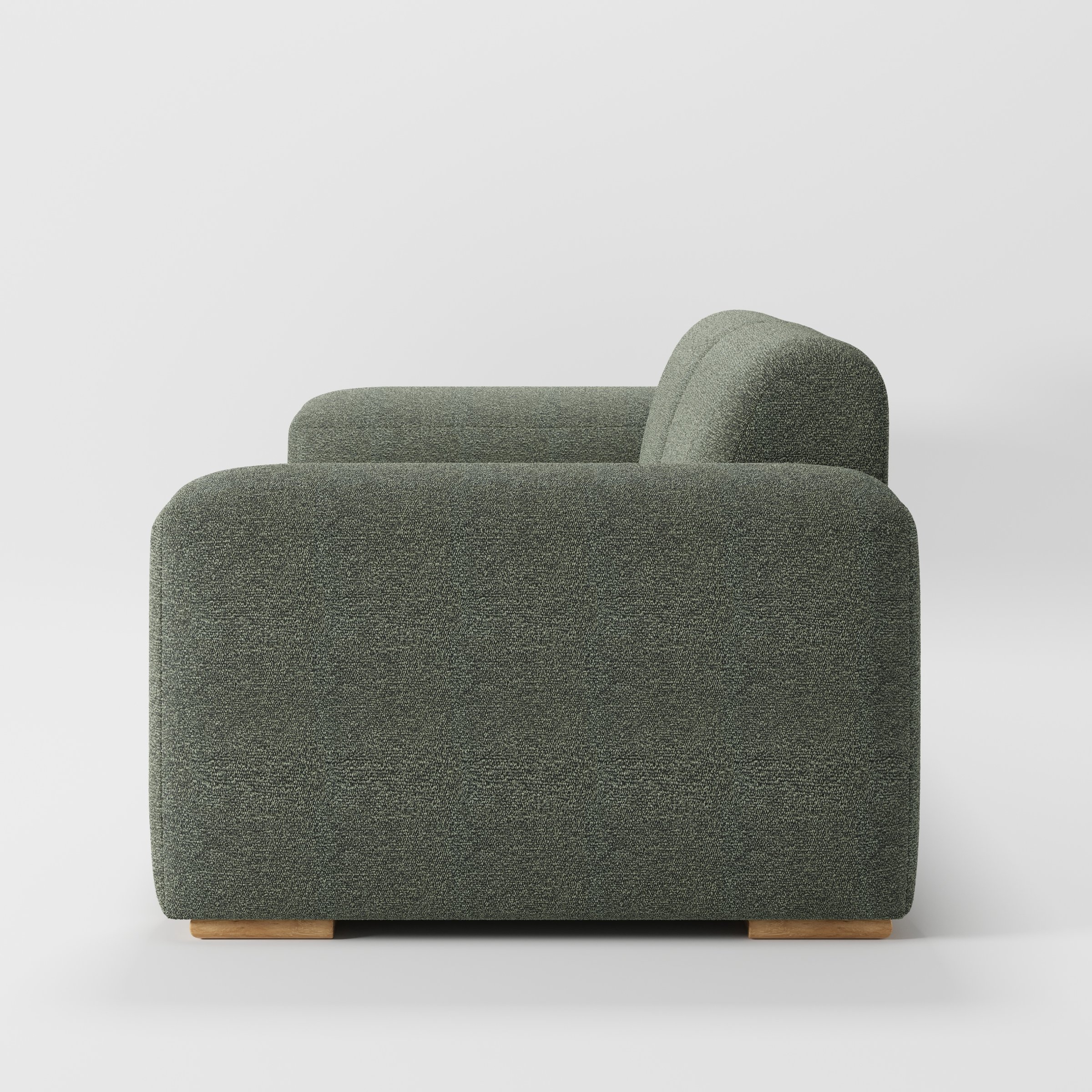 Darwell sofa in Kilda Boucle Moss shown in side profile displaying proportions and overall silhouette.