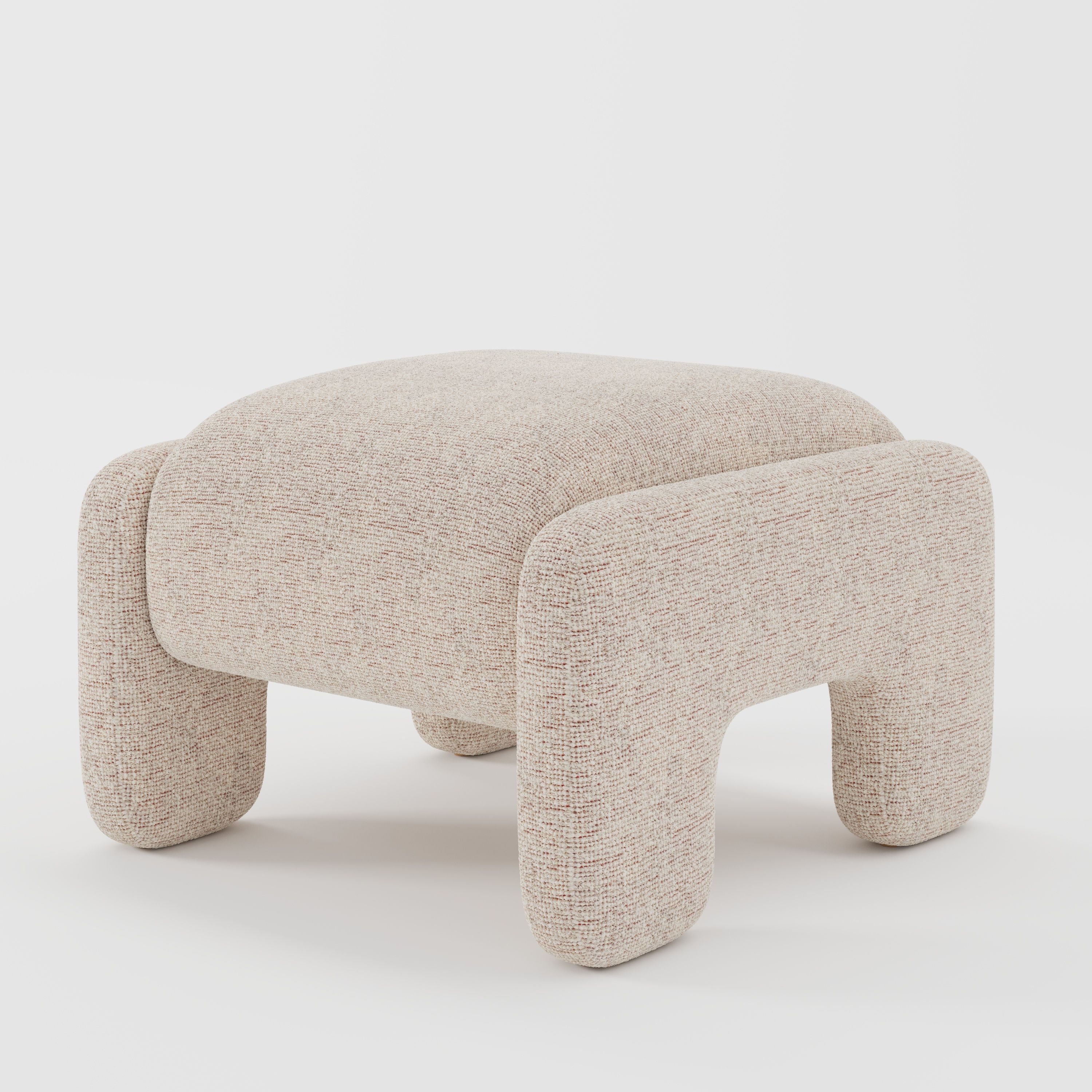 Inny footstool in Orsay bouclé cream and copper fabric, diagonal view highlighting curved silhouette and tactile texture