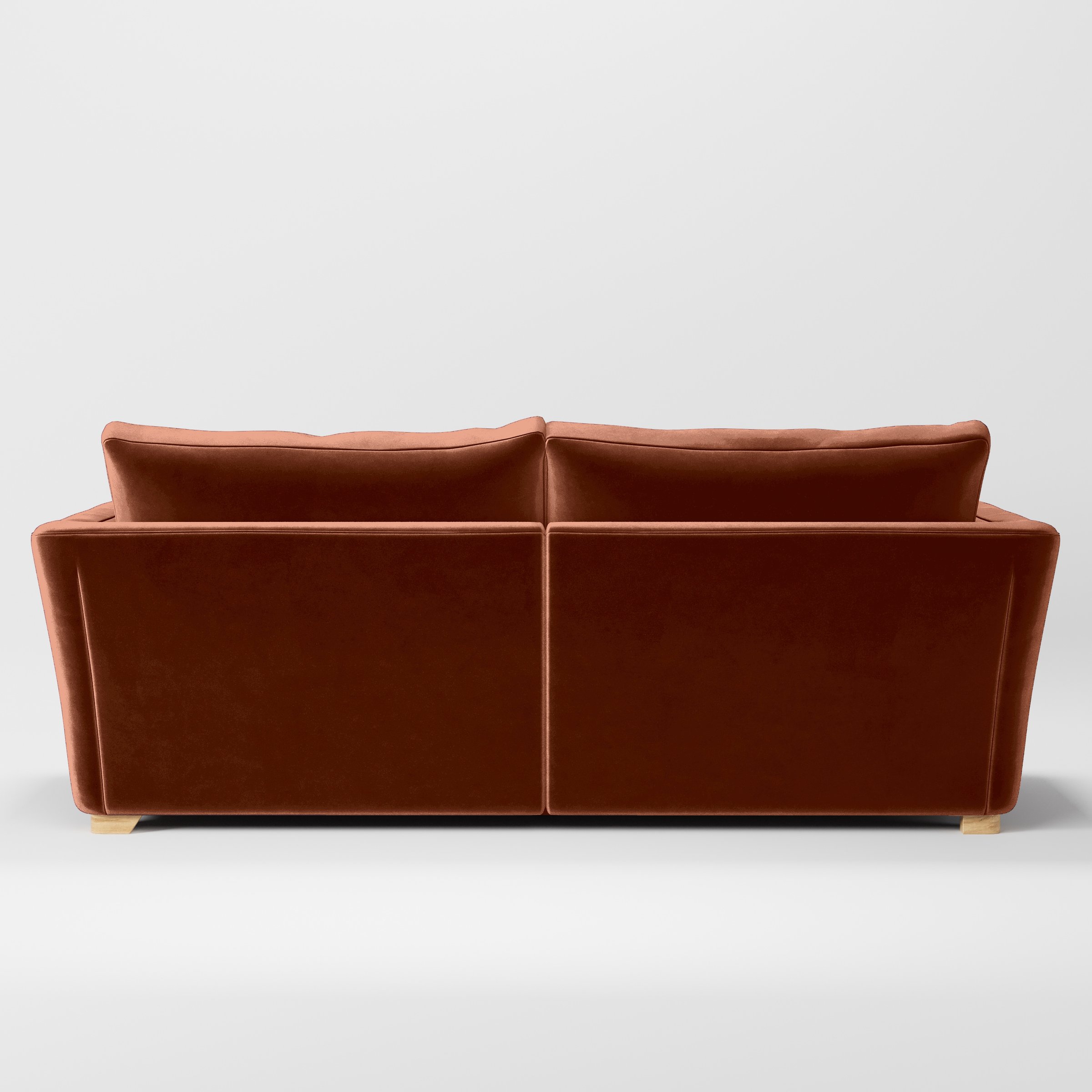 Rear view of the Stowe sofa upholstered in Plush EasyClean Velvet in Apricot.