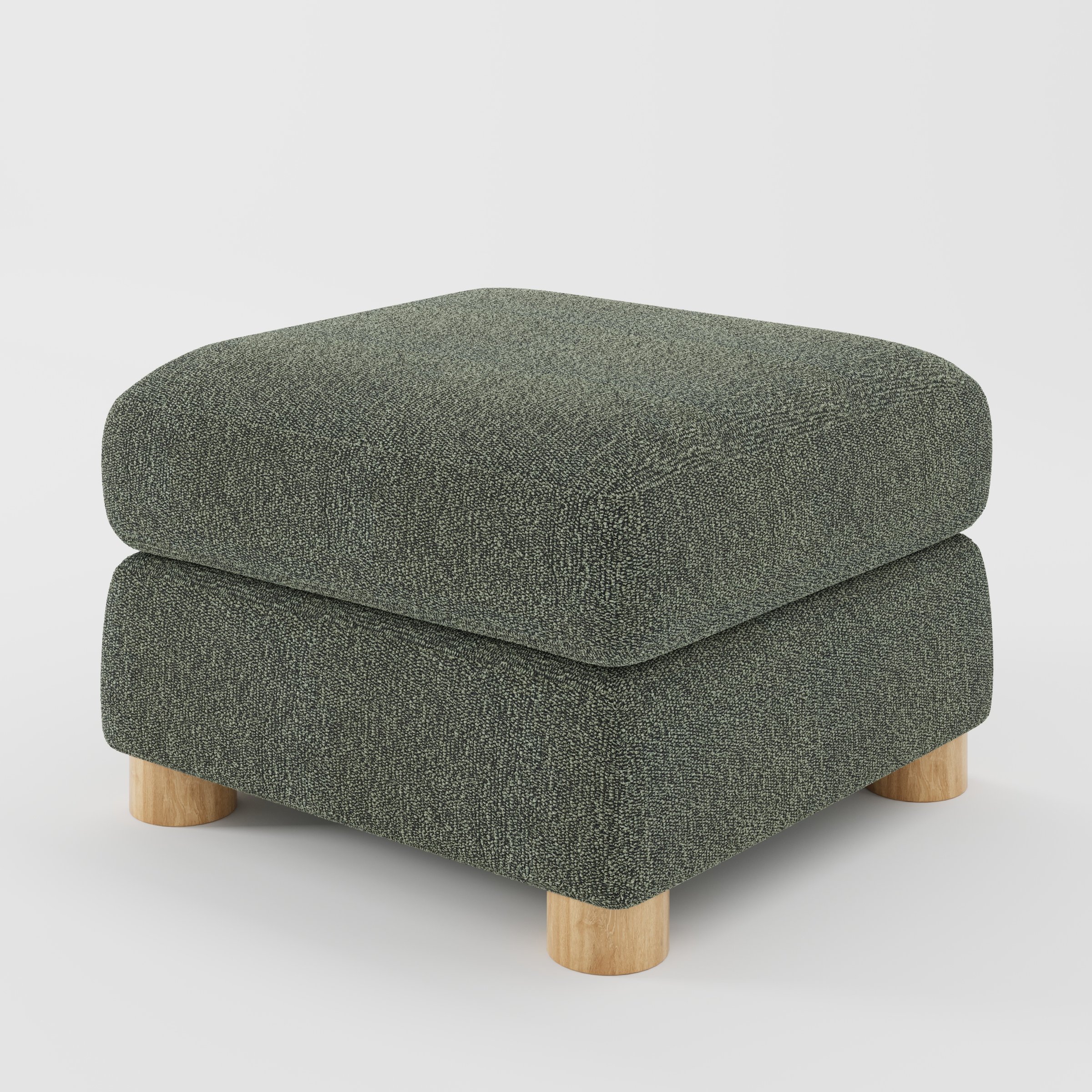 Windermere footstool in Kilda Boucle Moss shown at a diagonal angle highlighting soft corners and rounded wooden feet.