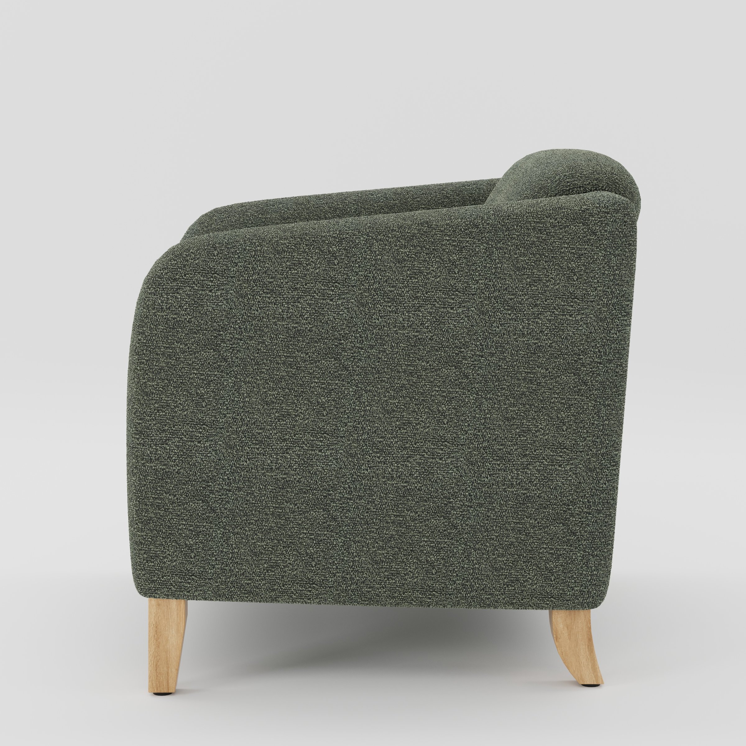 Erne armchair in Kilda Boucle Moss shown in side profile displaying proportions and overall silhouette.