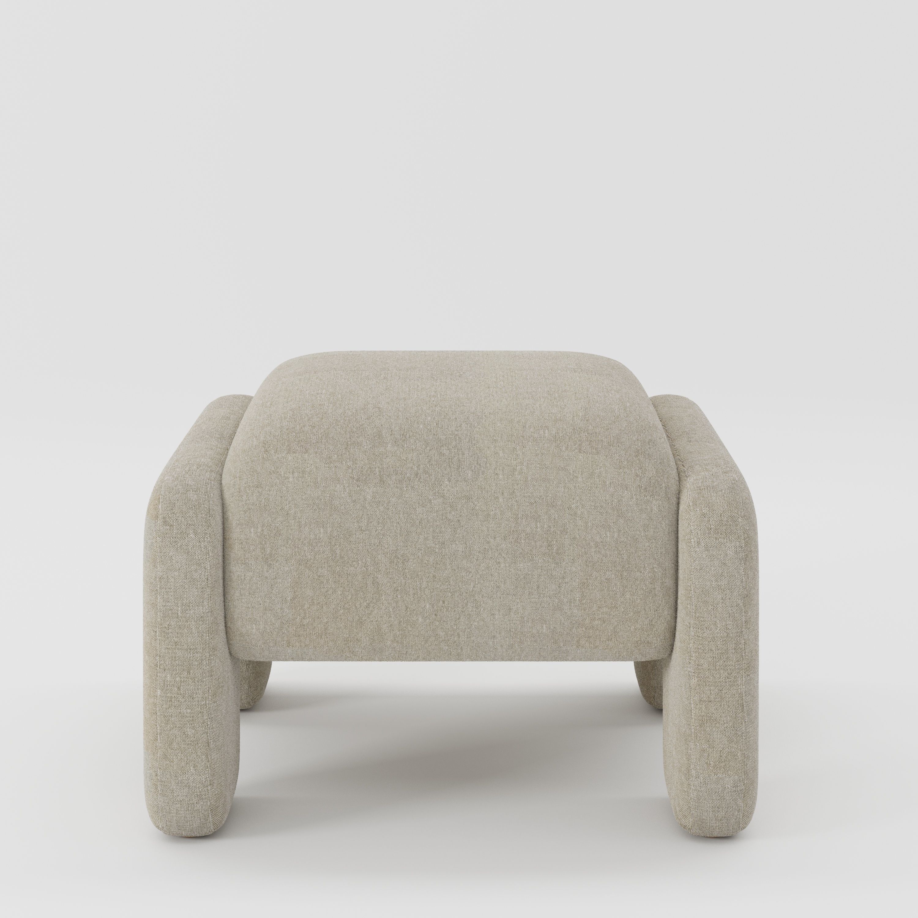 Inny footstool in Alderney linen oatmeal fabric, front view showing soft rounded form and natural linen texture