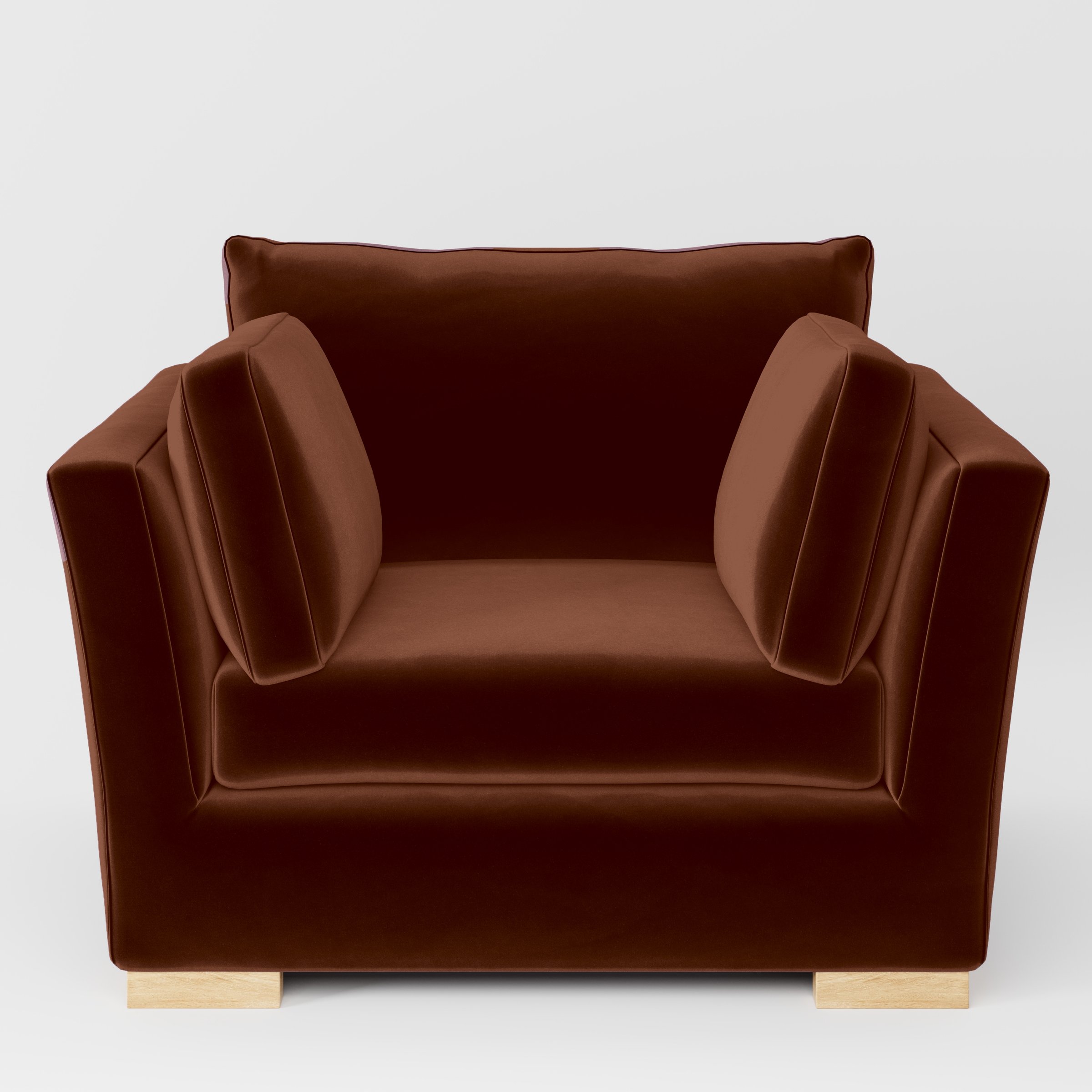 Front view of the Stowe armchair upholstered in Plush EasyClean Velvet in Maple.