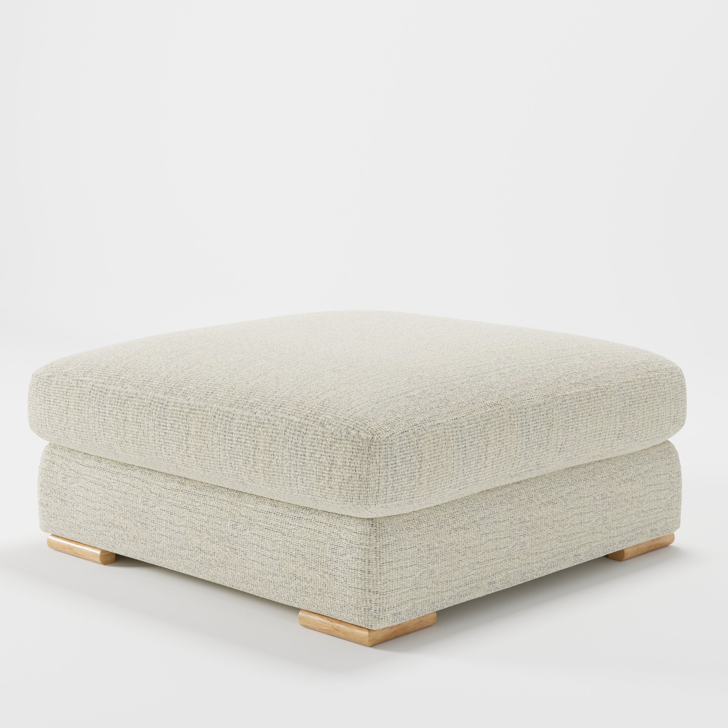Olton footstool in Orsay Boucle Cream and Marine shown at a diagonal angle highlighting low profile and inset wooden base.