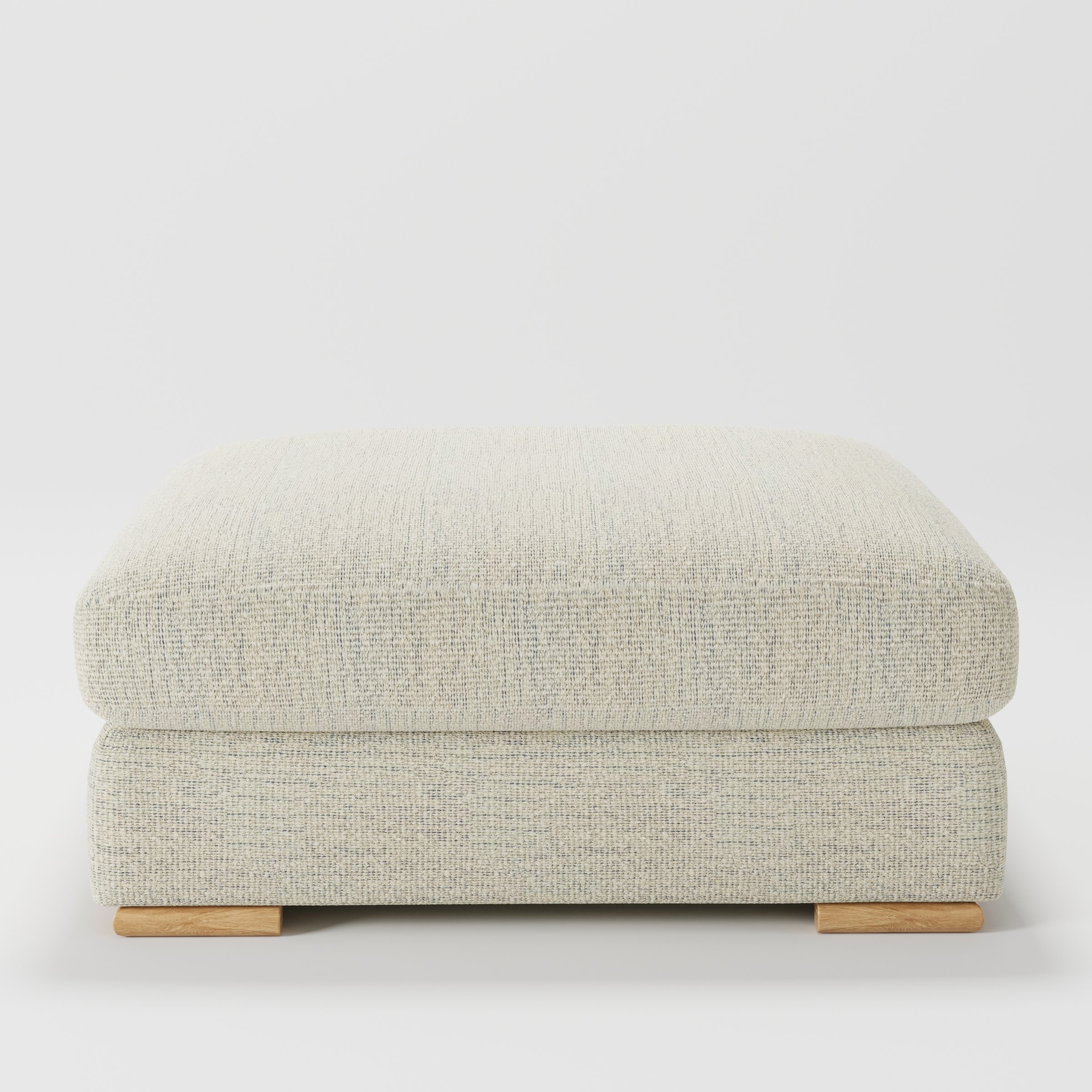 Olton footstool in Orsay Boucle Cream and Marine shown front-on against a neutral studio backdrop.