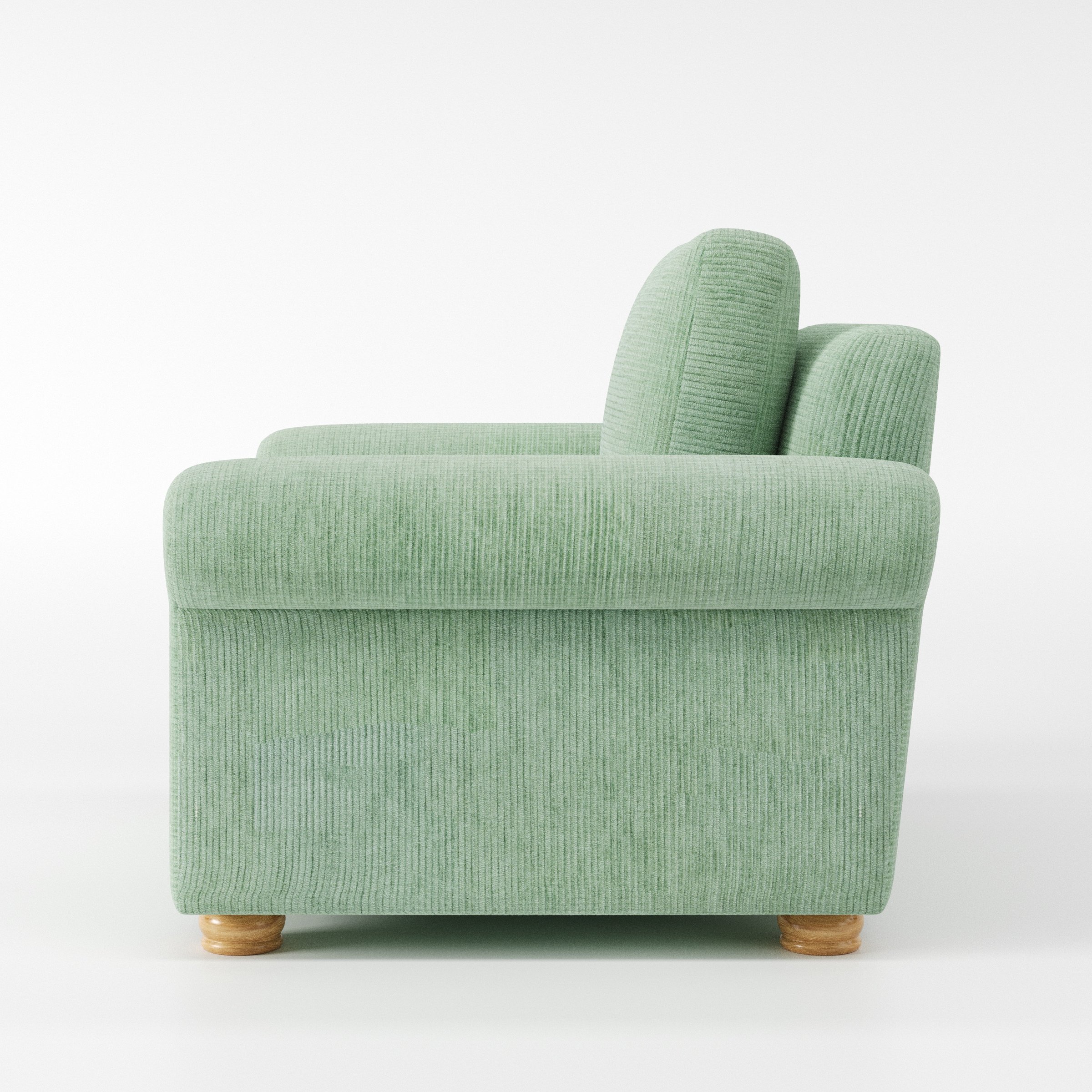 Anna Lee armchair in Caldey Velvet Corduroy Eucalyptus shown in side profile displaying proportions and overall silhouette.