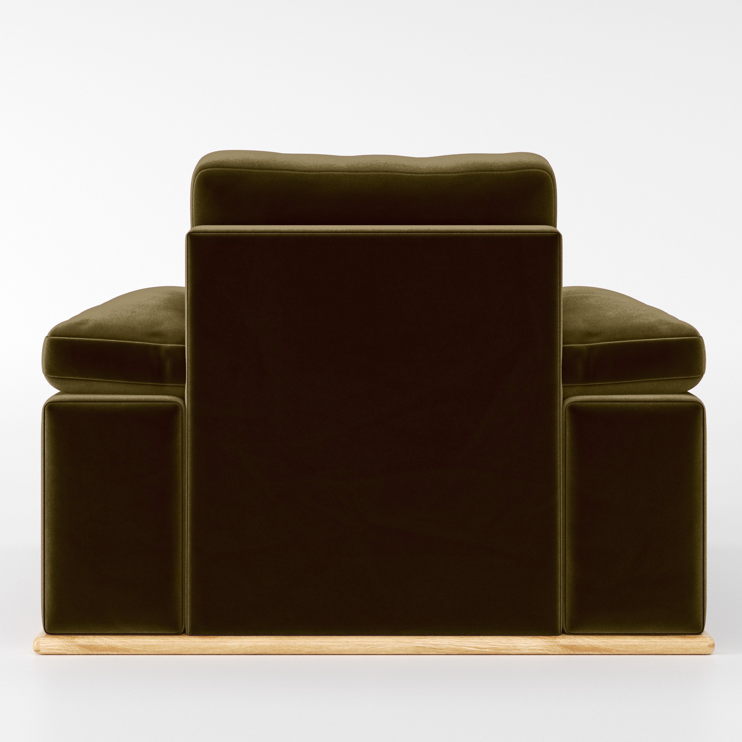 Rear view of the Cusher armchair upholstered in Plush EasyClean Velvet in Cedar.