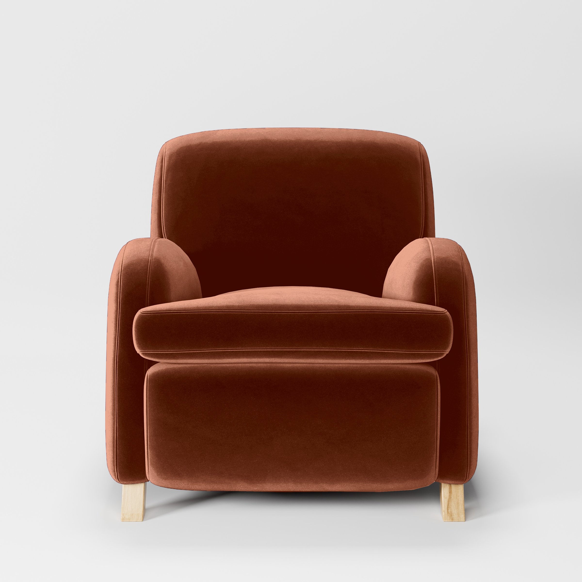 Front view of the Rye armchair upholstered in Plush EasyClean Velvet in Apricot.