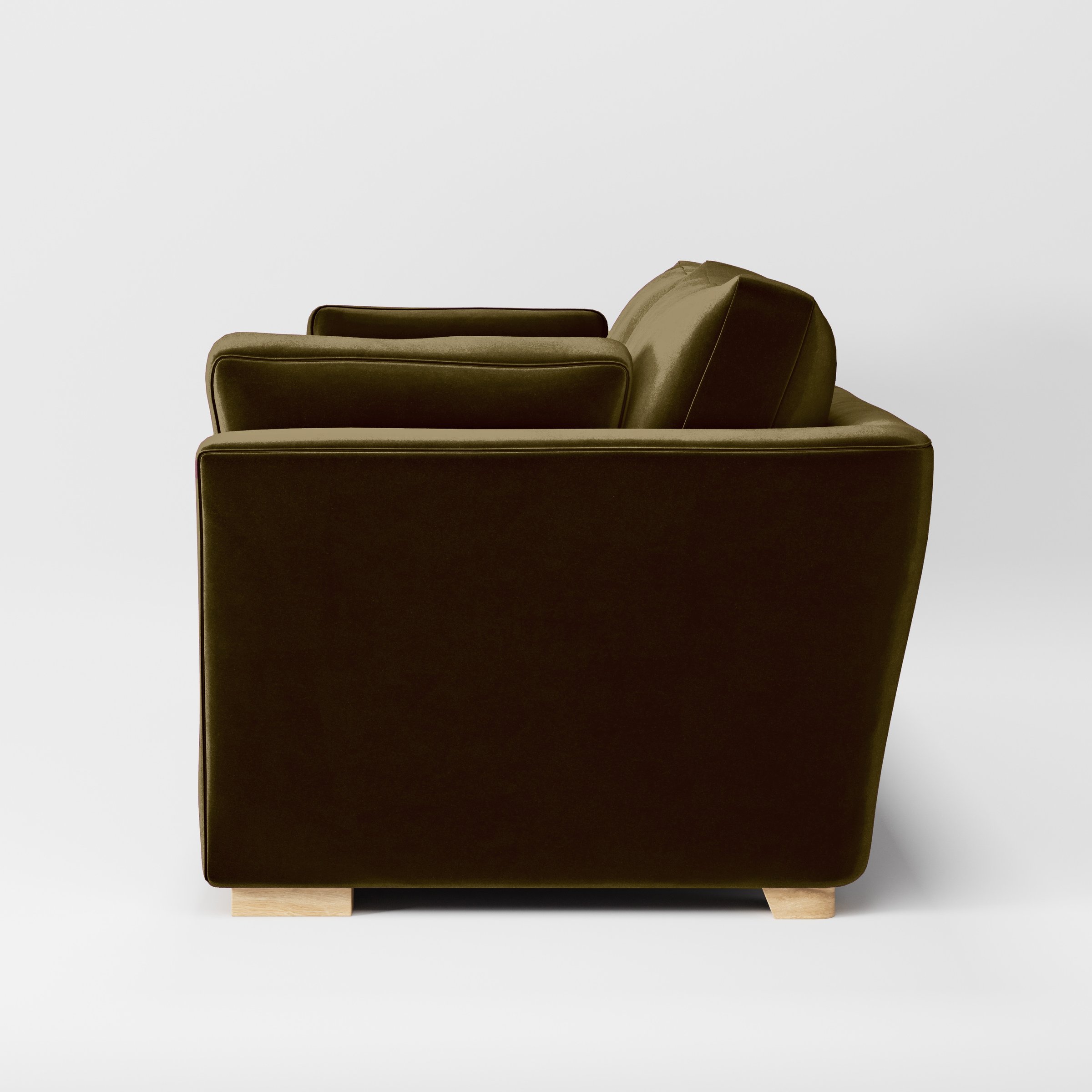 Side view of the Stowe sofa upholstered in Plush EasyClean Velvet in Cedar.