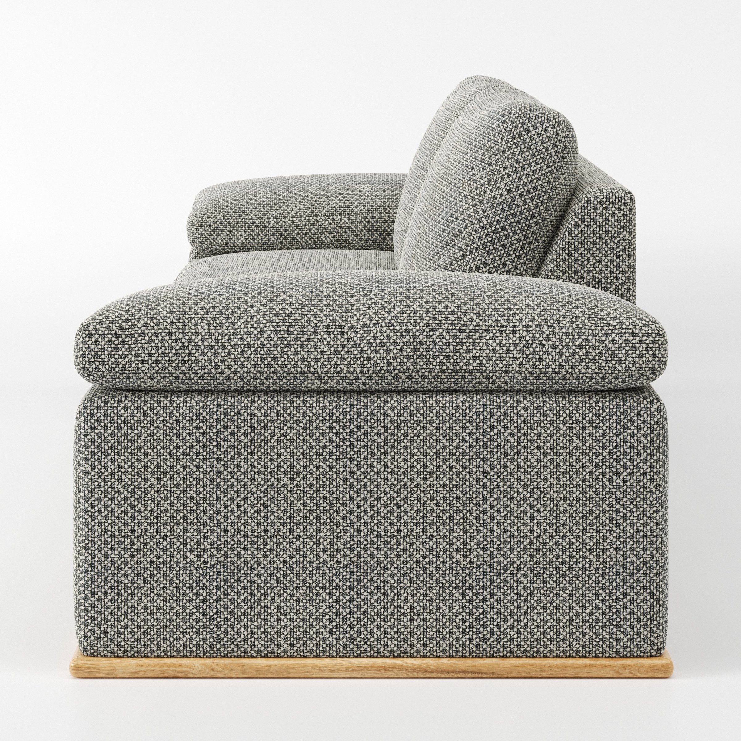 Cusher sofa in Rousay Wool Blend Tar and Chalk shown in side profile displaying proportions and overall silhouette.