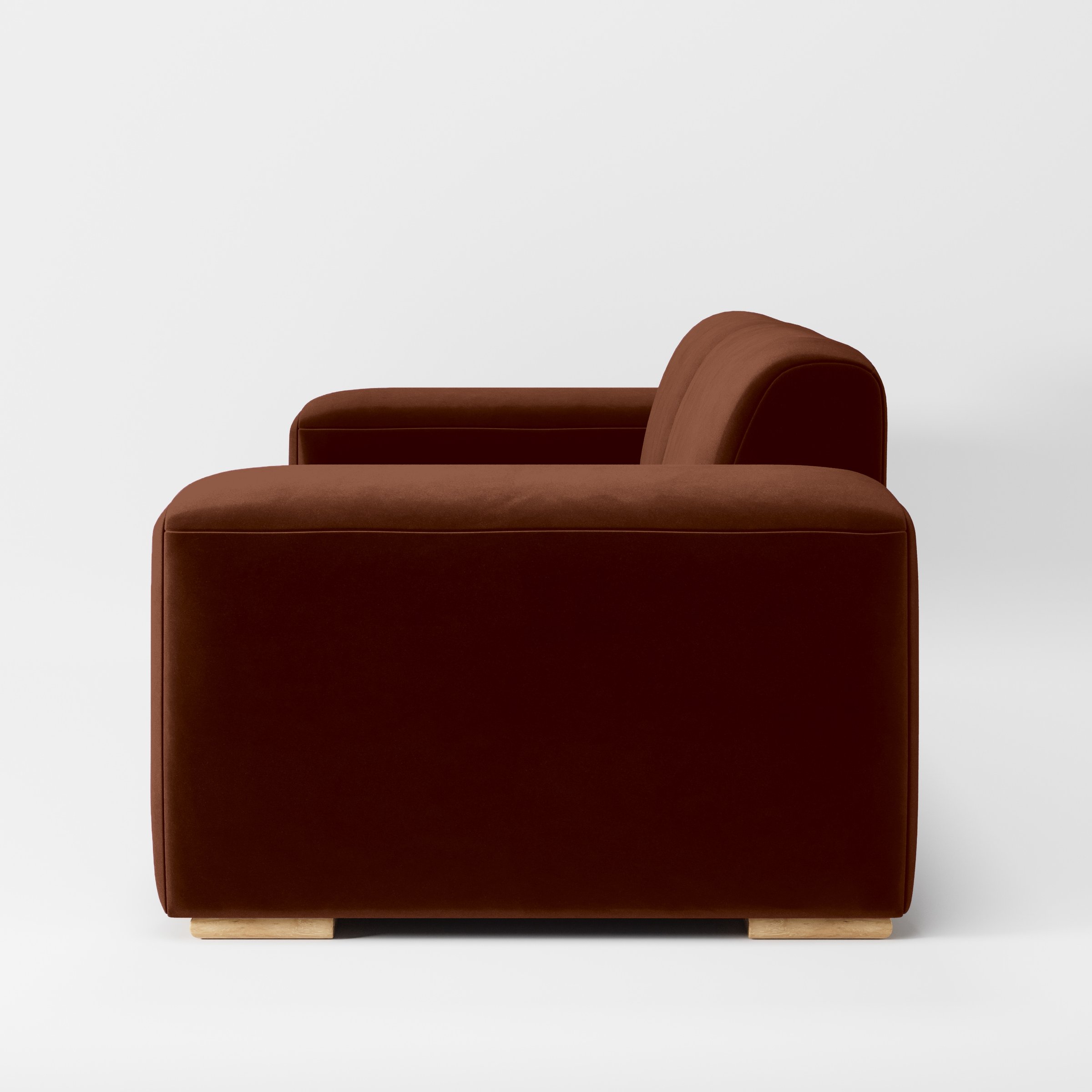 Side view of the Darwell sofa upholstered in Plush EasyClean Velvet in Maple.