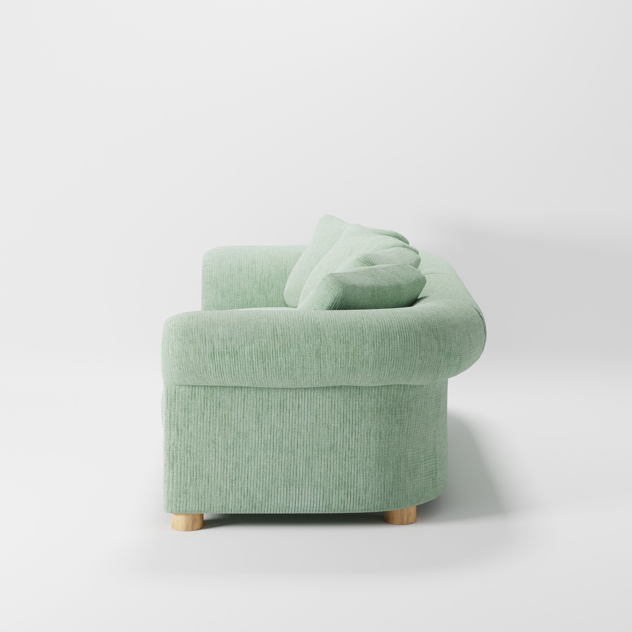 Windermere sofa in Caldey Velvet Corduroy Eucalyptus shown in side profile displaying proportions and overall silhouette.