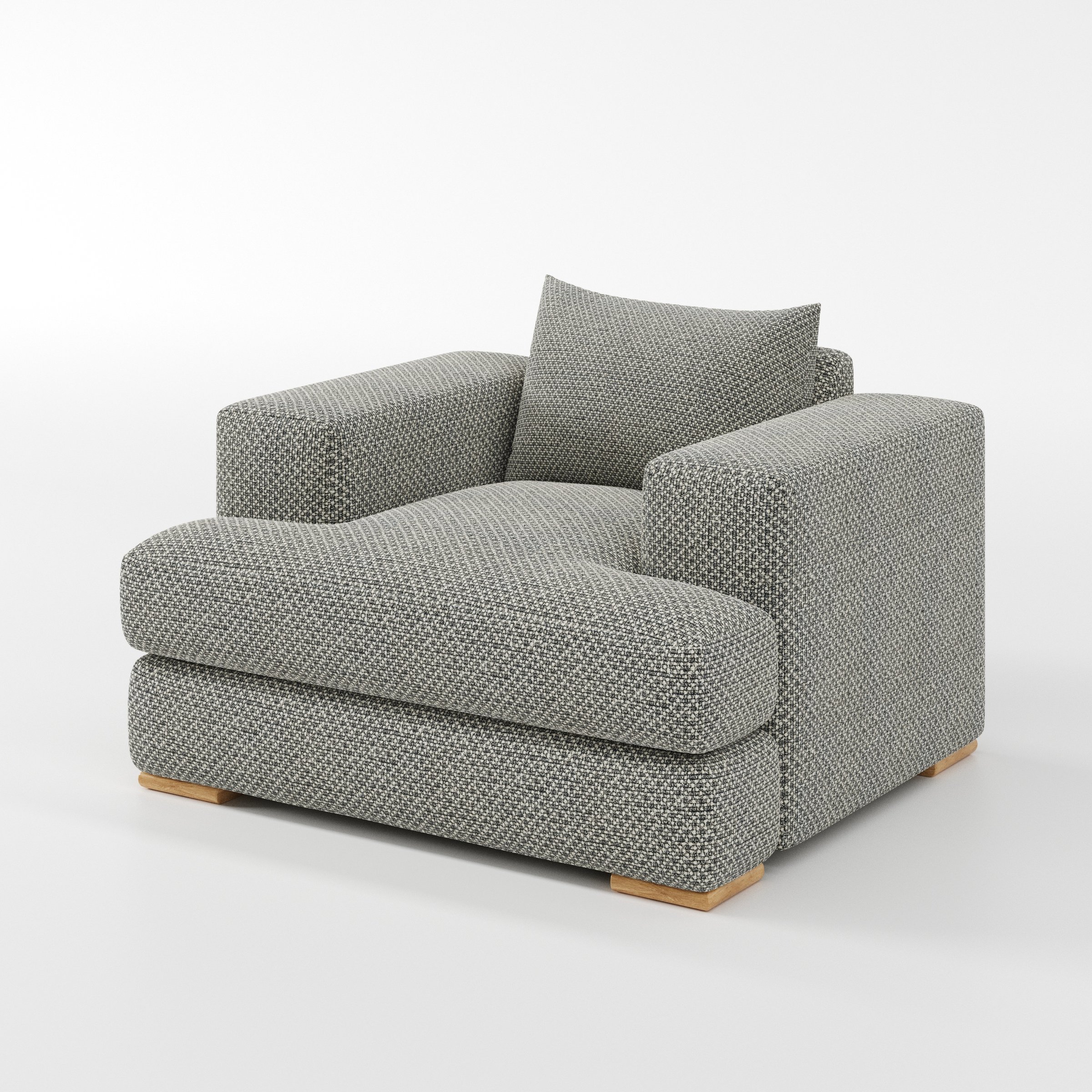 Fane armchair in Rousay Wool Blend Tar and Chalk shown at a diagonal angle highlighting arms and seat depth.