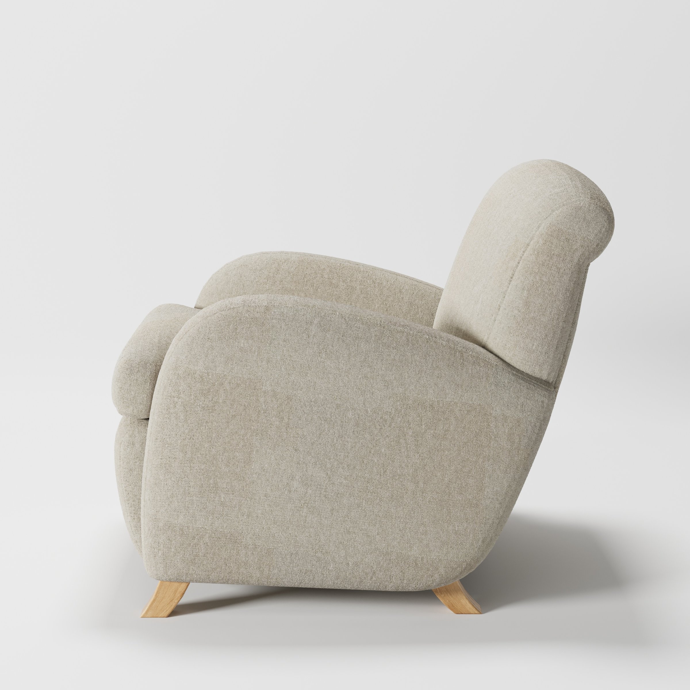 Rye armchair in Alderney Linen Oatmeal shown in side profile displaying proportions and overall silhouette.