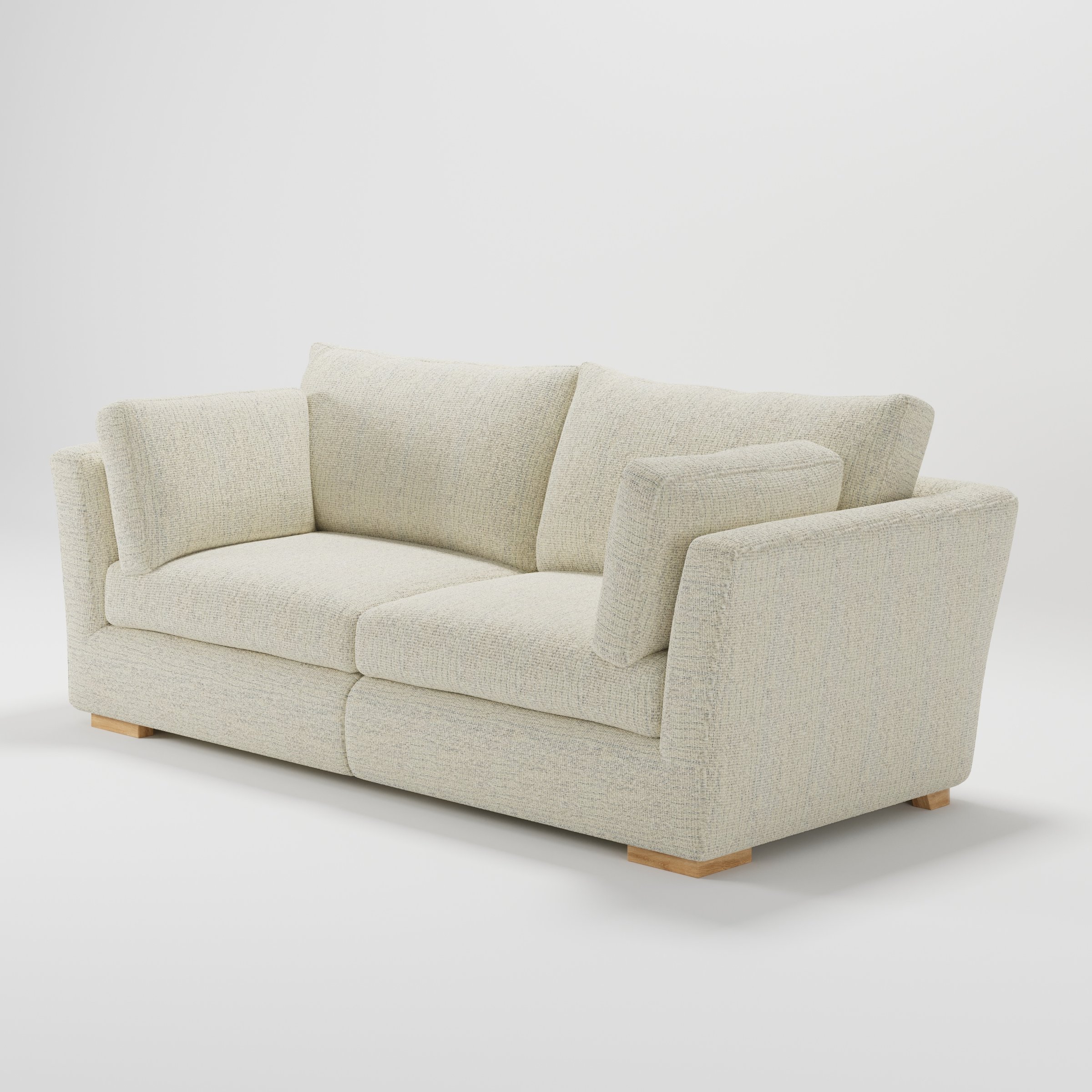 Stowe sofa in Orsay Boucle Cream and Marine shown at a diagonal angle highlighting arm profile and seat depth.