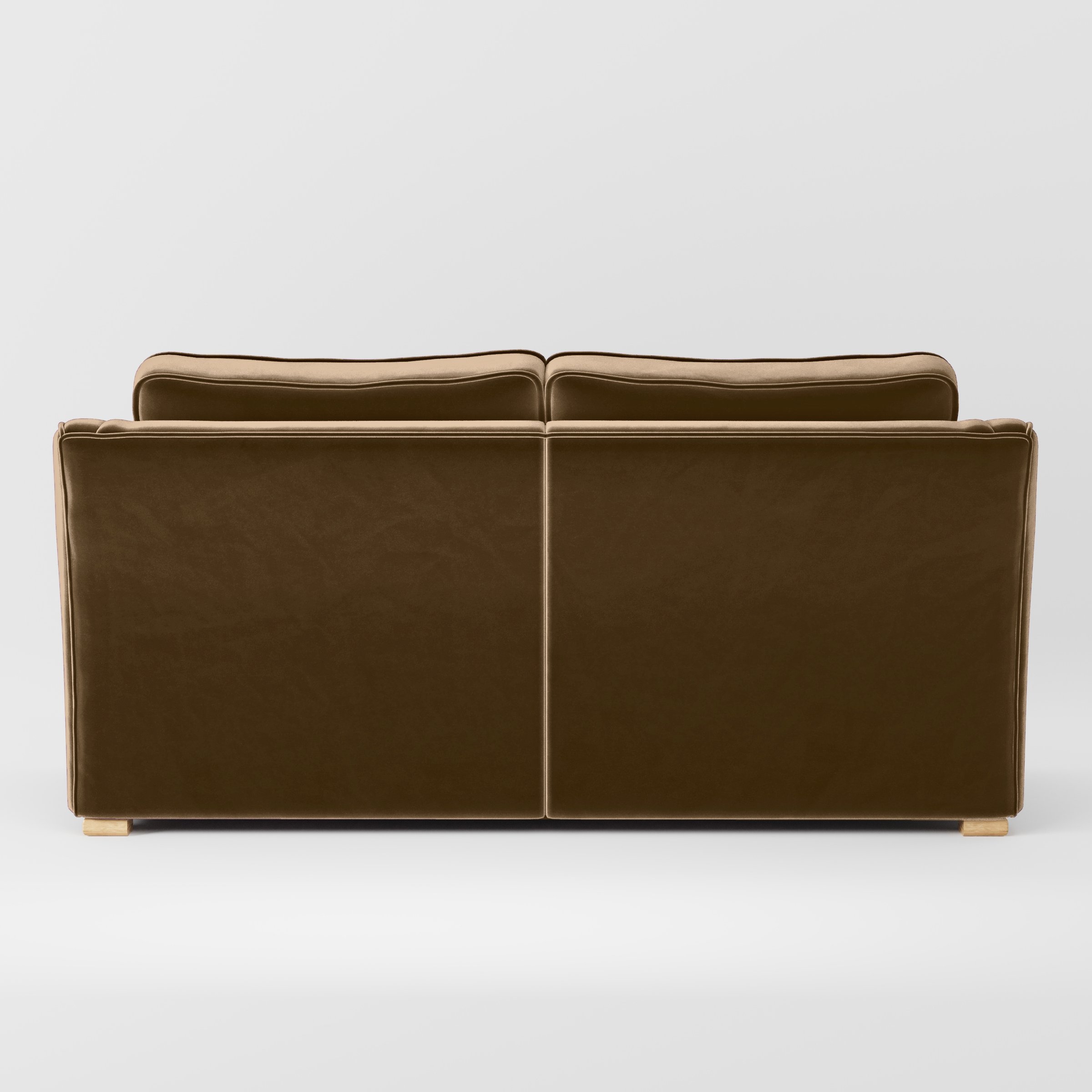 Rear view of the Cashel sofa upholstered in Plush EasyClean Velvet in Caribou.