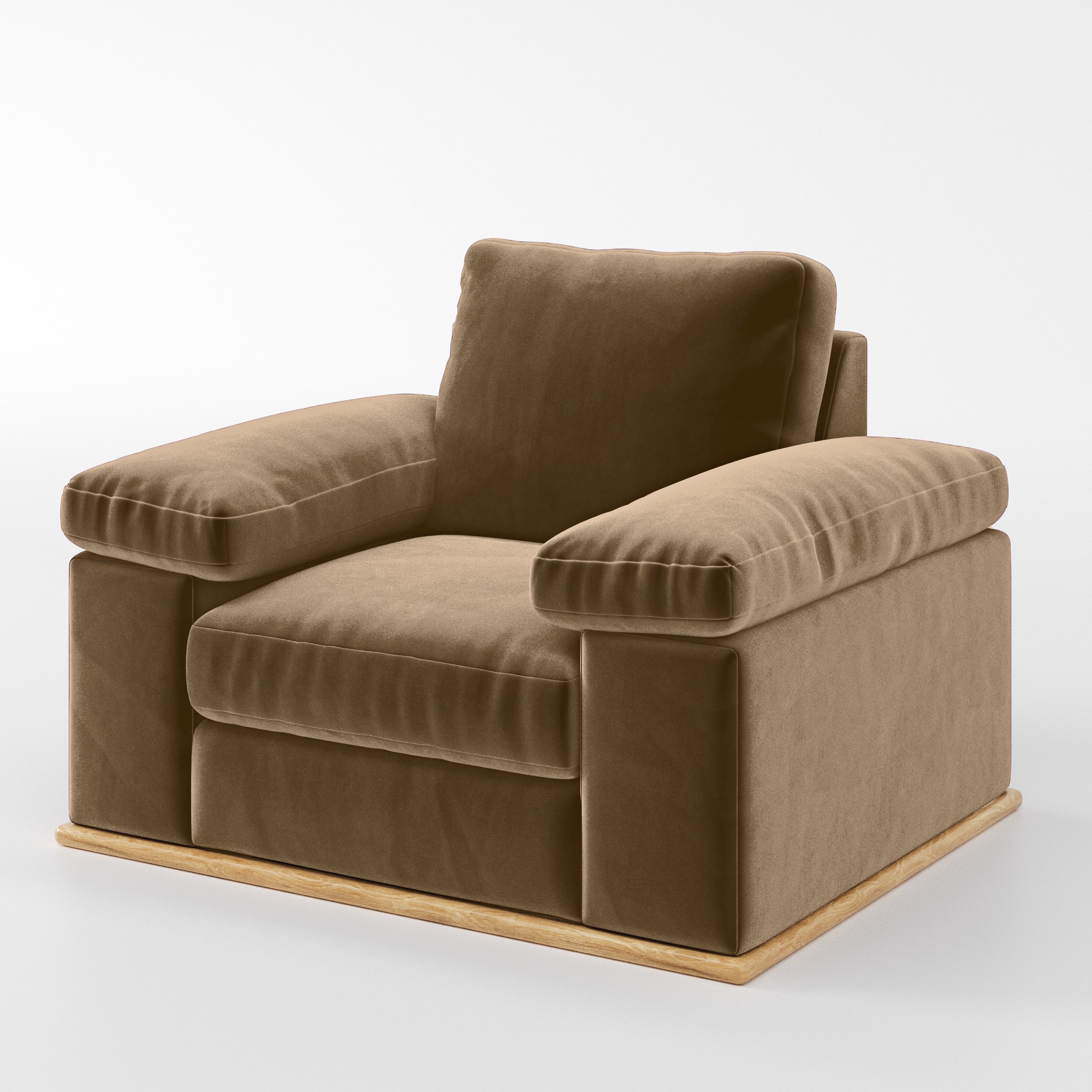 Diagonal view of the Cusher armchair upholstered in Plush EasyClean Velvet in Caribou.