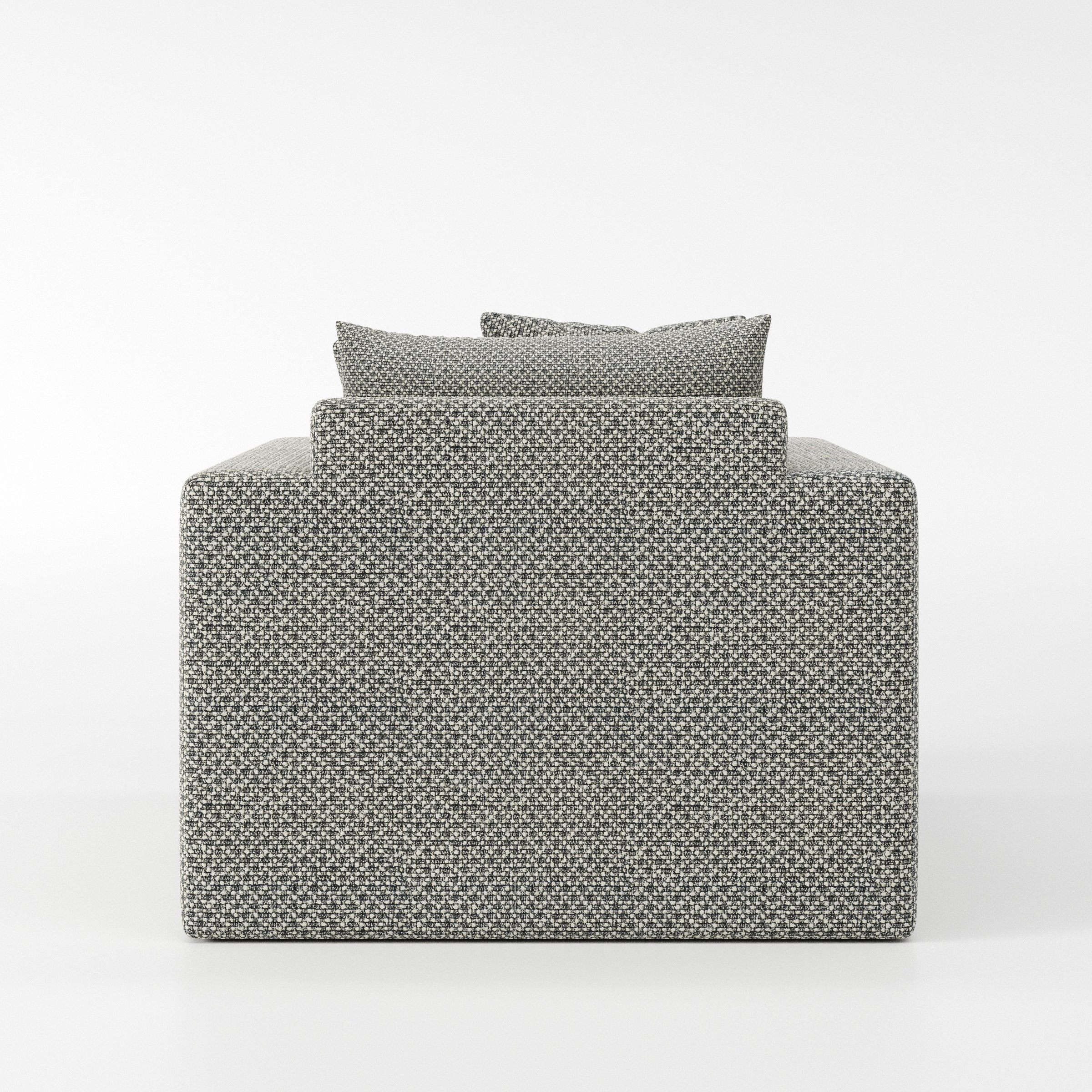 Coniston armchair in Rousay Wool Blend Tar and Chalk shown from the rear highlighting backrest shape and upholstery finish.