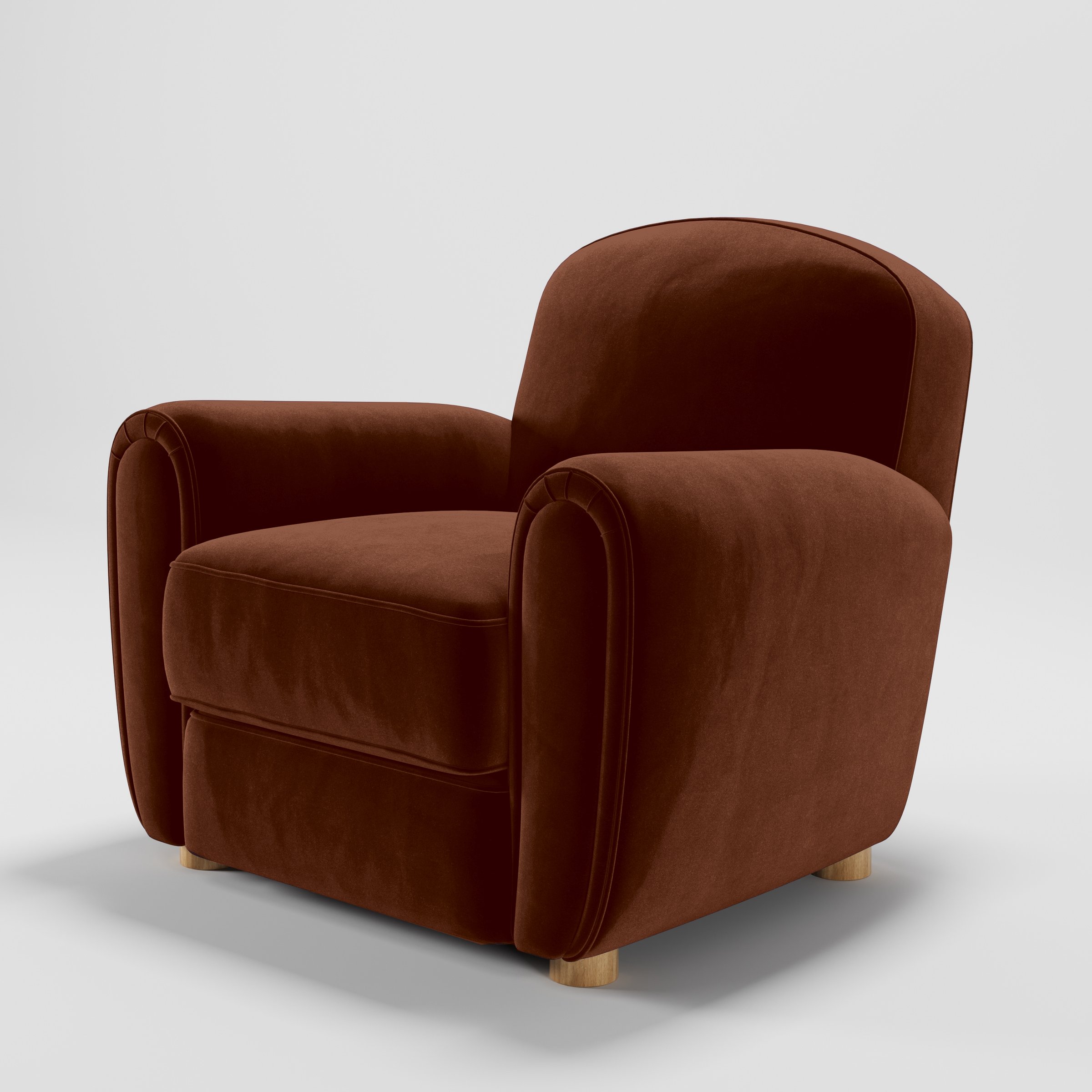 Diagonal view of the Fergus armchair upholstered in Plush EasyClean Velvet in Maple.