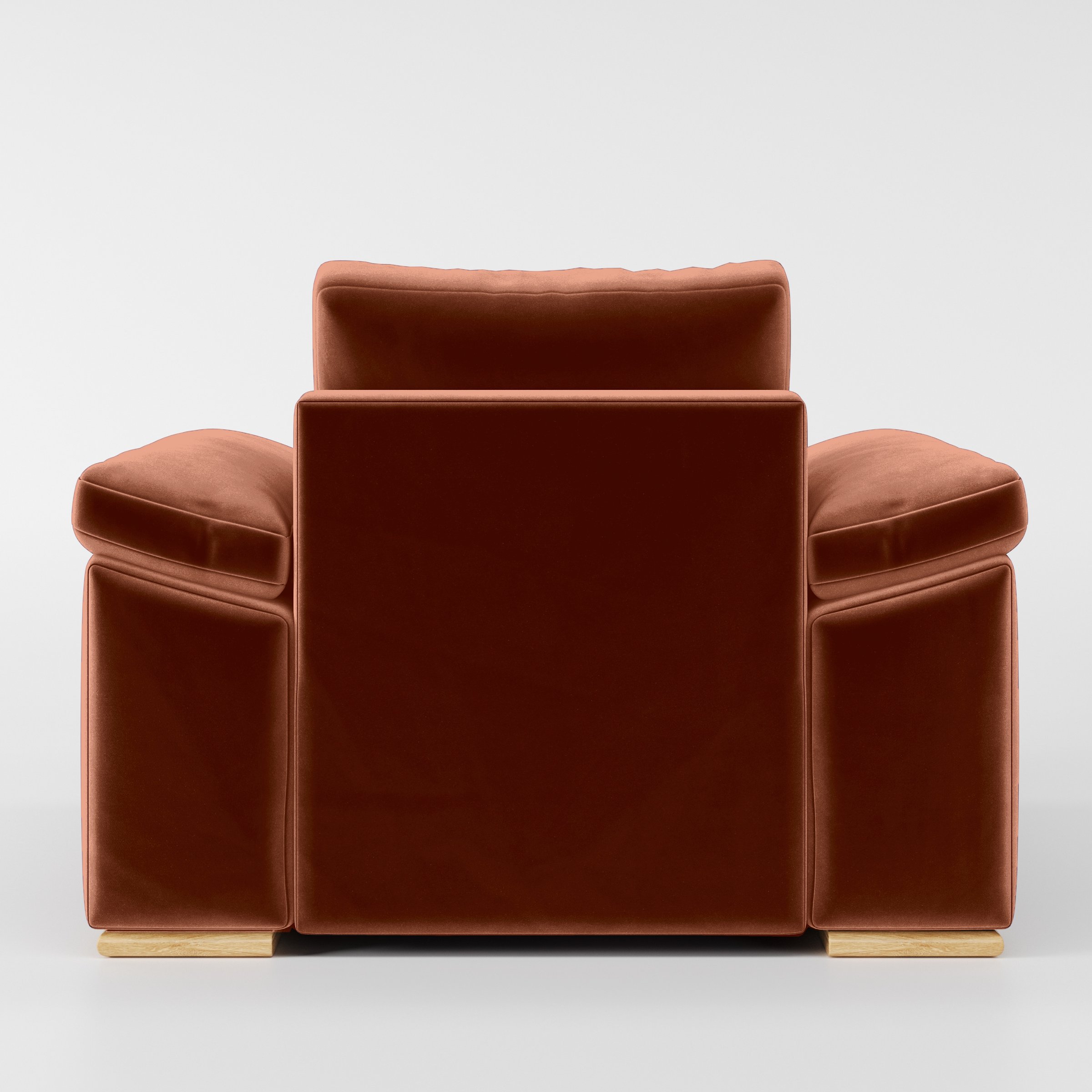 Rear view of the Moy armchair upholstered in Plush EasyClean Velvet in Apricot.