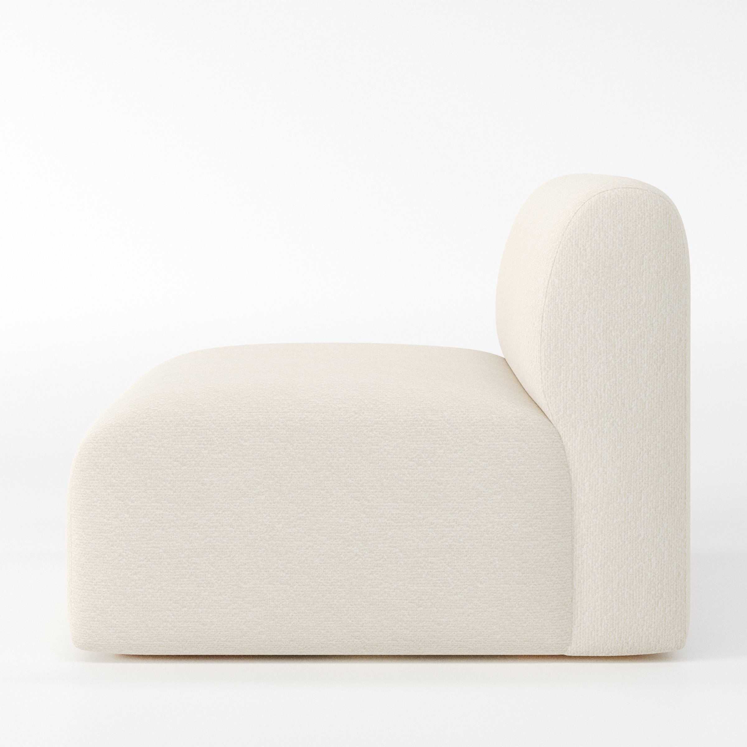 Drumquin modular sofa single unit in Kilda Bouclé Cream shown from the side showing the rounded backrest and deep seat profile.