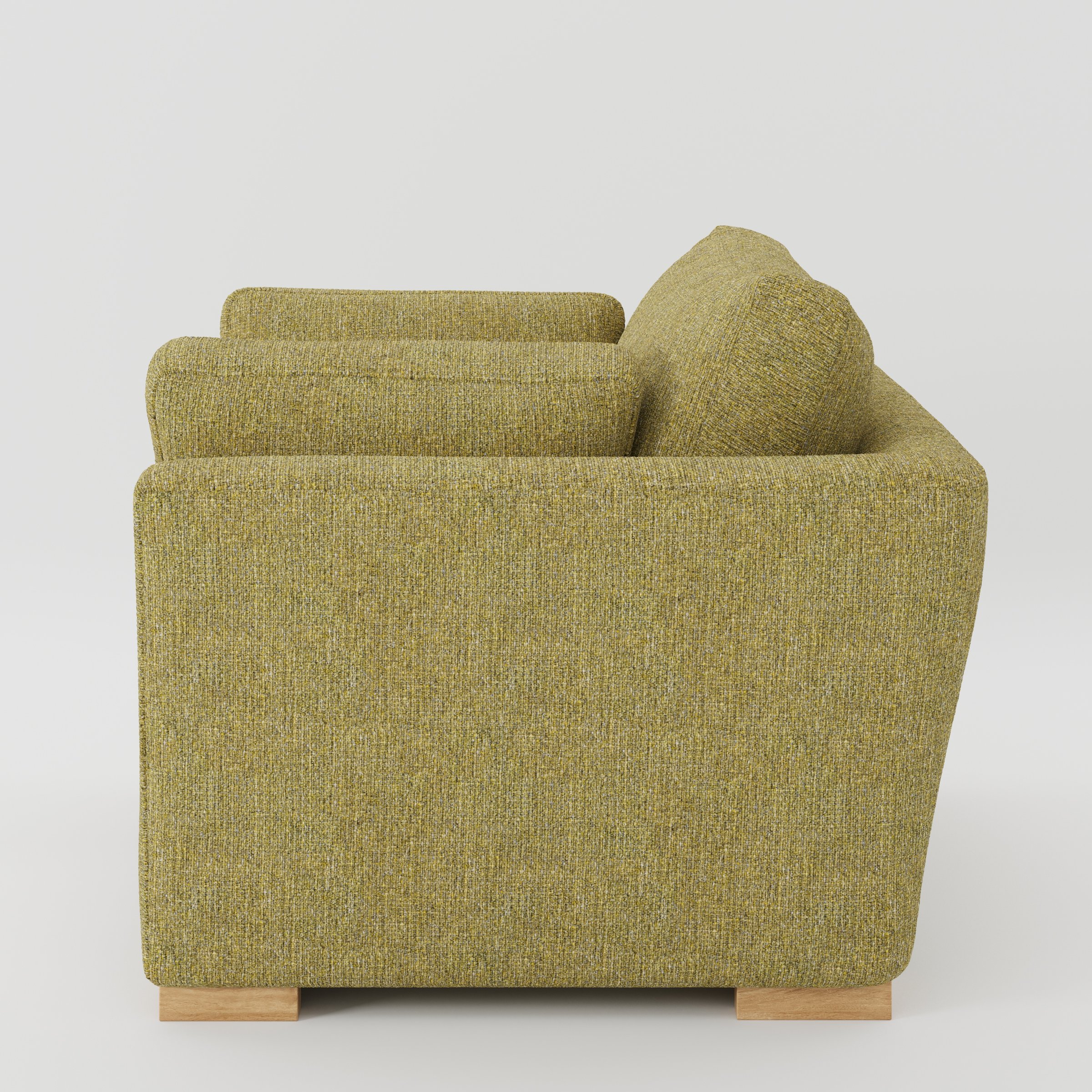 Stowe armchair in Heyling Tweed Sencha shown in side profile displaying proportions and overall silhouette.