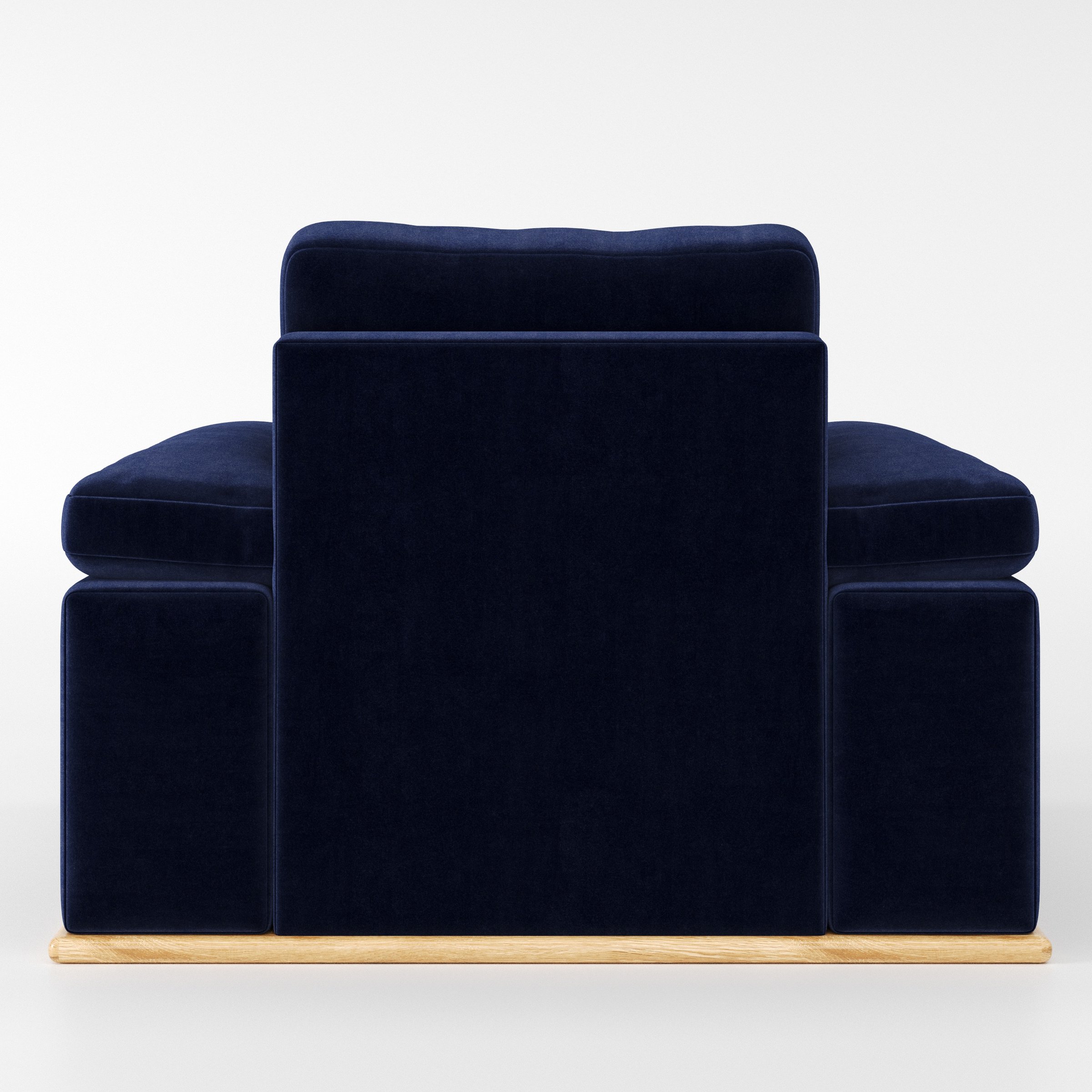 Cusher armchair in Noss Velvet Navy shown from the rear highlighting backrest shape and upholstery finish.
