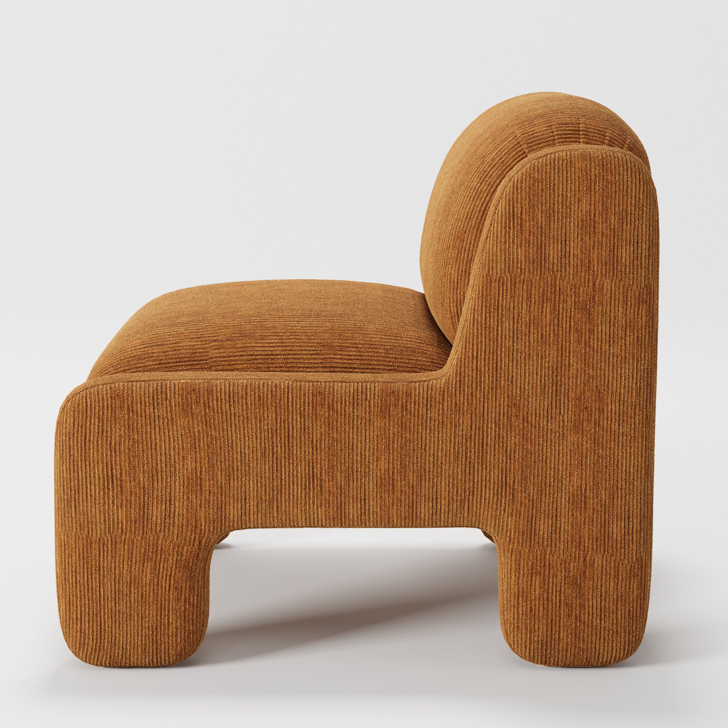 Inny armchair in Caldey Velvet Corduroy Tobacco shown in side profile displaying proportions and overall silhouette.