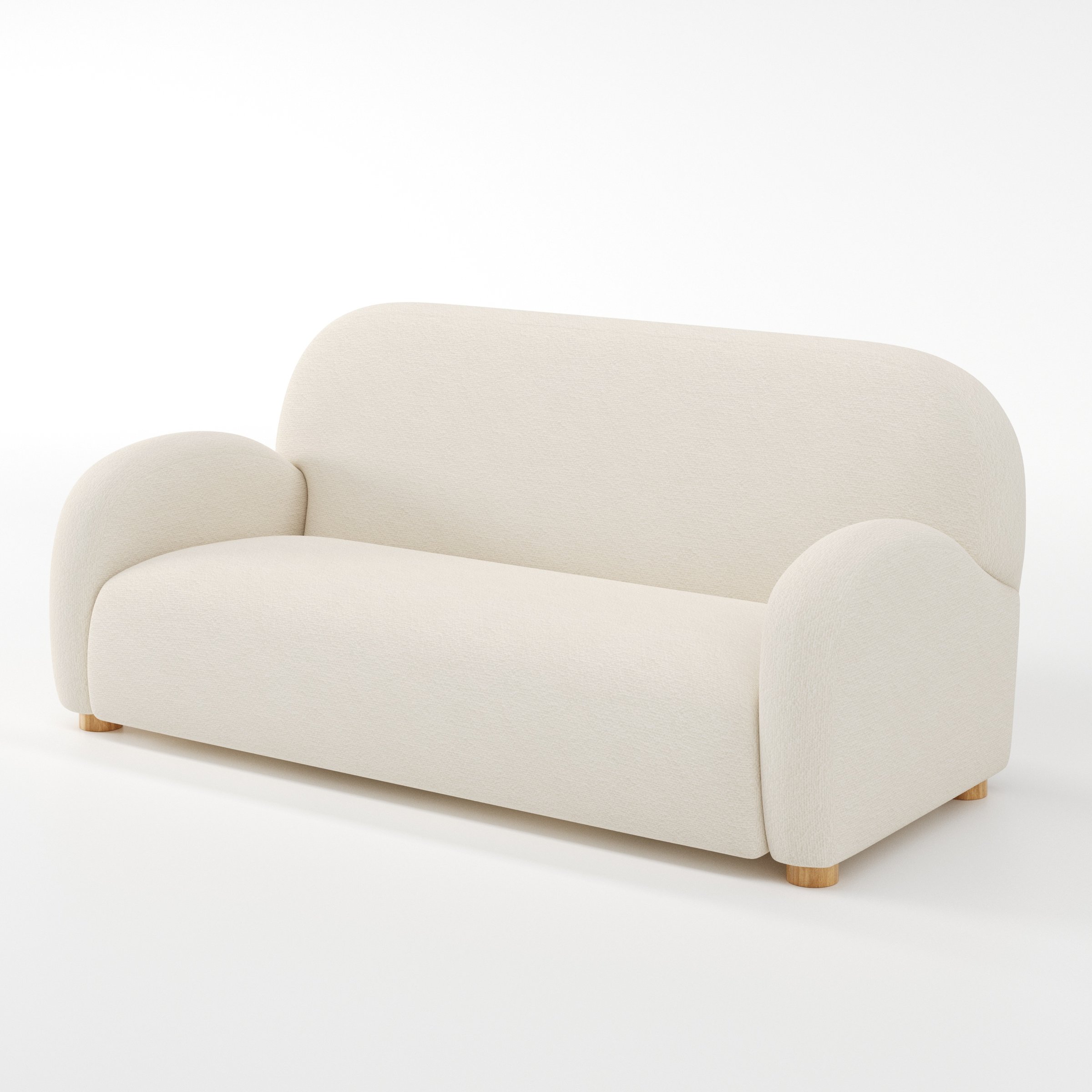 Awe sofa in Kilda Boucle Cream shown at a diagonal angle highlighting arm profile and seat depth.